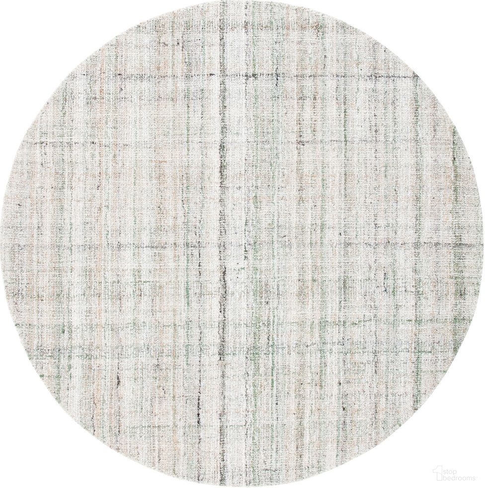 The appearance of Abstract Hand Tufted Green and Sage 6' x 6' Round Rugs designed by Safavieh in the modern / contemporary interior design. This sage green piece of furniture was selected by 1StopBedrooms from Abstract Collection to add a touch of cosiness and style into your home. Sku: ABT143Y-6R. Material: Polyester.