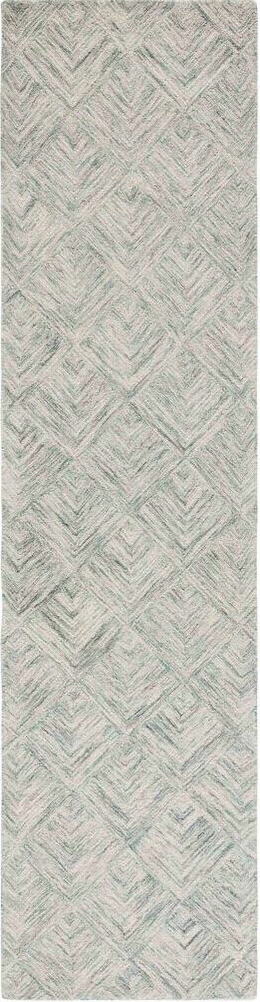 The appearance of Abstract Hand Tufted Grey and Turquoise 2'-3" x 9' Runner Rugs designed by Safavieh in the transitional interior design. This gray turquoise piece of furniture  was selected by 1StopBedrooms from Abstract Collection to add a touch of cosiness and style into your home. Sku: ABT428F-29. Material: Wool.