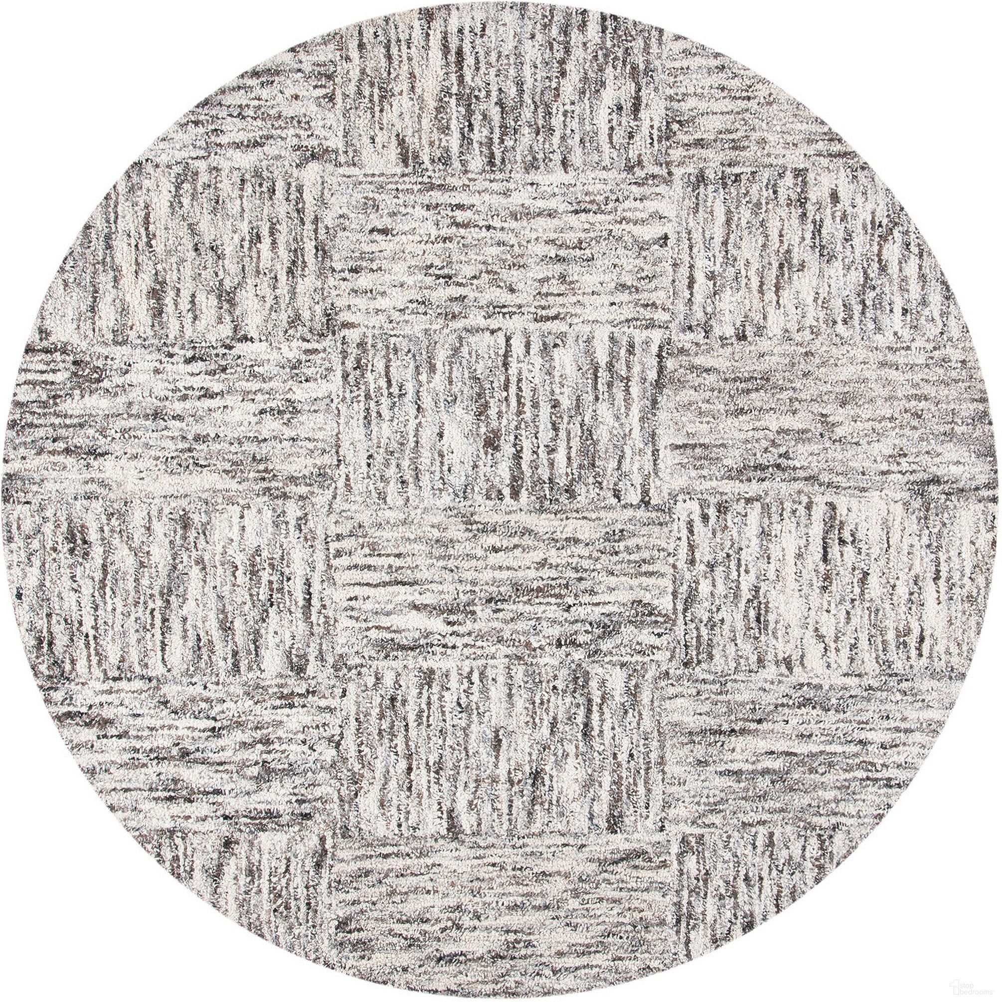 The appearance of Abstract Hand Tufted Ivory and Charcoal 6' x 6' Round Rugs designed by Safavieh in the transitional interior design. This ivory and charcoal piece of furniture was selected by 1StopBedrooms from Abstract Collection to add a touch of cosiness and style into your home. Sku: ABT601A-6R. Material: Wool.