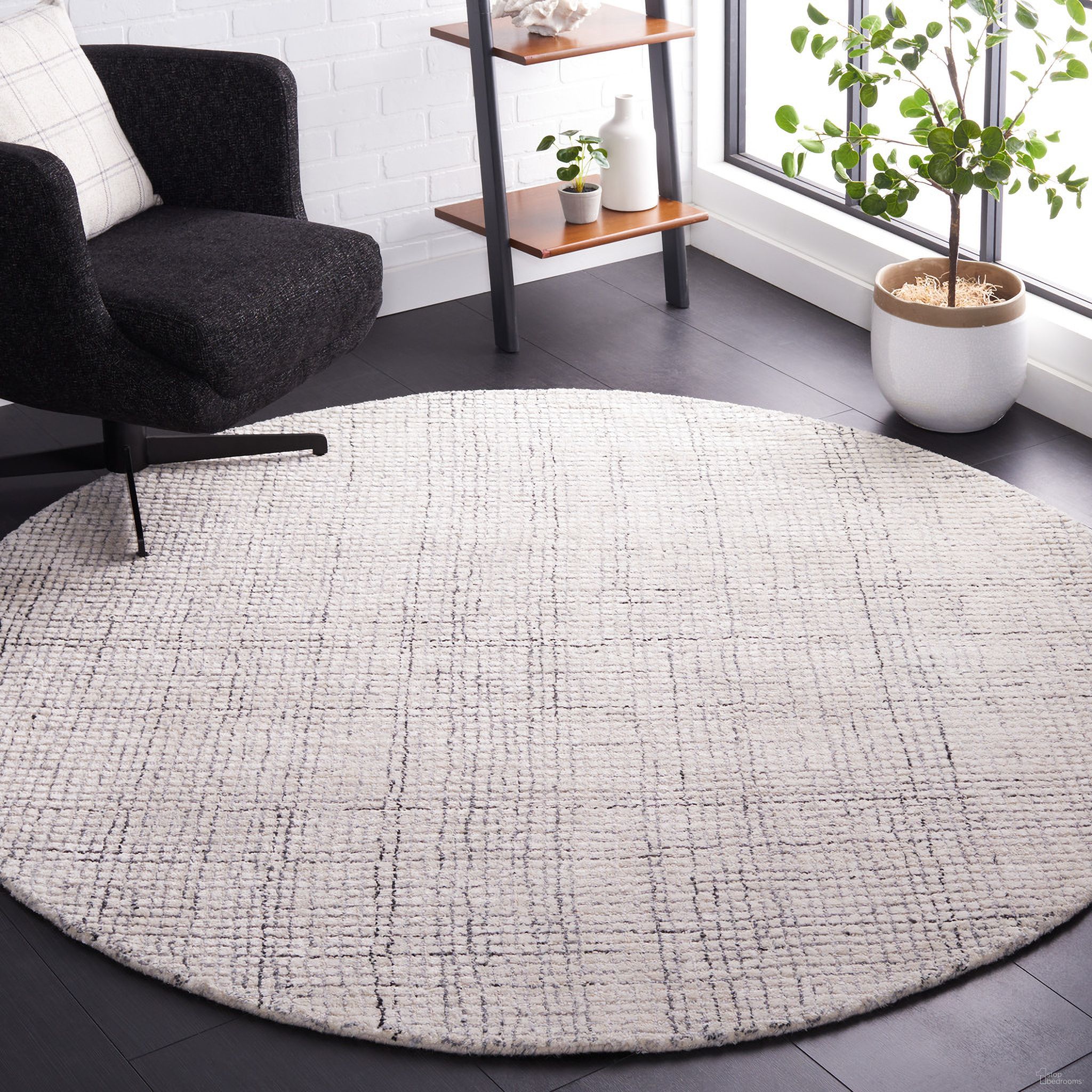 The appearance of Abstract Hand Tufted Ivory and Grey 6' x 6' Round Rugs designed by Safavieh in the modern / contemporary interior design. This ivory and grey piece of furniture  was selected by 1StopBedrooms from Abstract Collection to add a touch of cosiness and style into your home. Sku: ABT470F-6R. Material: Viscose.