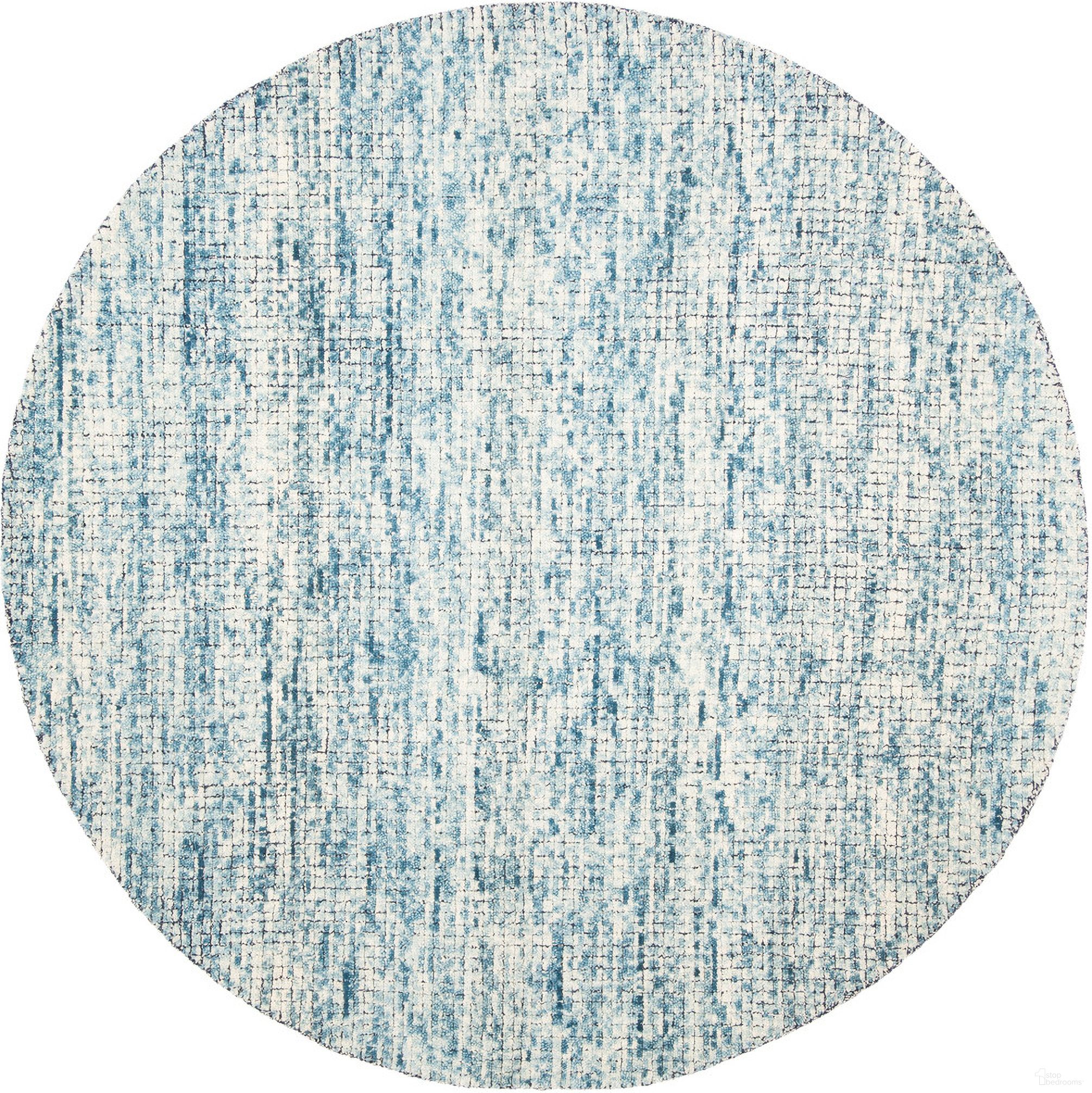 The appearance of Abstract Hand Tufted Ivory and Navy 6' x 6' Round Rugs designed by Safavieh in the modern / contemporary interior design. This ivory and navy piece of furniture  was selected by 1StopBedrooms from Abstract Collection to add a touch of cosiness and style into your home. Sku: ABT473M-6R. Material: Wool.