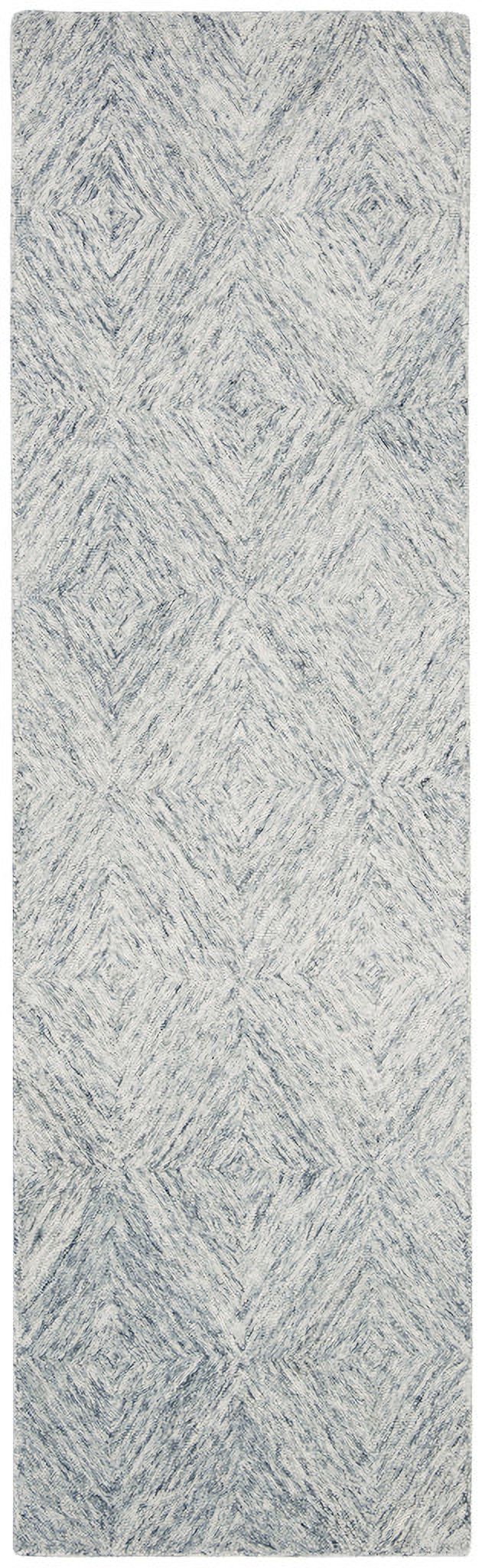 The appearance of Abstract Hand Tufted Silver 2'-3" x 8' Runner Rugs designed by Safavieh in the modern / contemporary interior design. This silver piece of furniture  was selected by 1StopBedrooms from Abstract Collection to add a touch of cosiness and style into your home. Sku: ABT767G-28. Material: Wool.