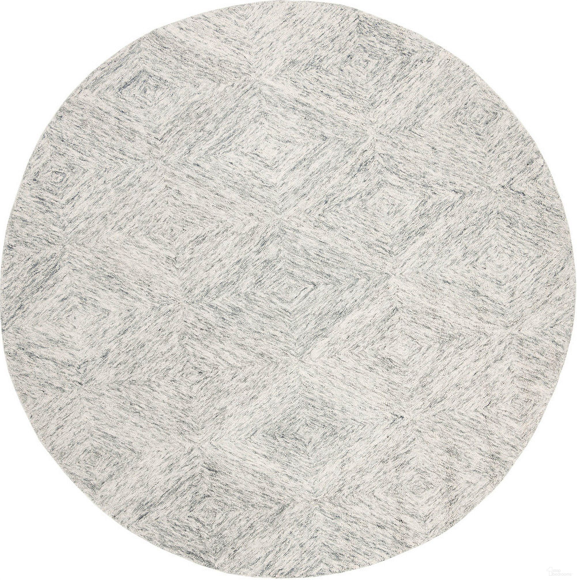 The appearance of Abstract Hand Tufted Silver 6' x 6' Round Rugs designed by Safavieh in the modern / contemporary interior design. This silver piece of furniture  was selected by 1StopBedrooms from Abstract Collection to add a touch of cosiness and style into your home. Sku: ABT767G-6R. Material: Wool.