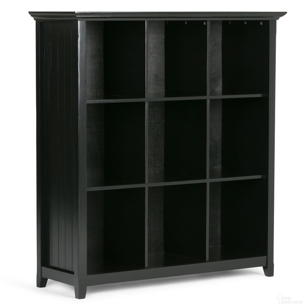 The appearance of Acadian Solid Wood 9 Cube Bookcase and Storage Unit In Black designed by Simpli Home in the transitional interior design. This black piece of furniture was selected by 1StopBedrooms from Acadian Collection to add a touch of cosiness and style into your home. Sku: AXCB222-BL. Material: Pine.