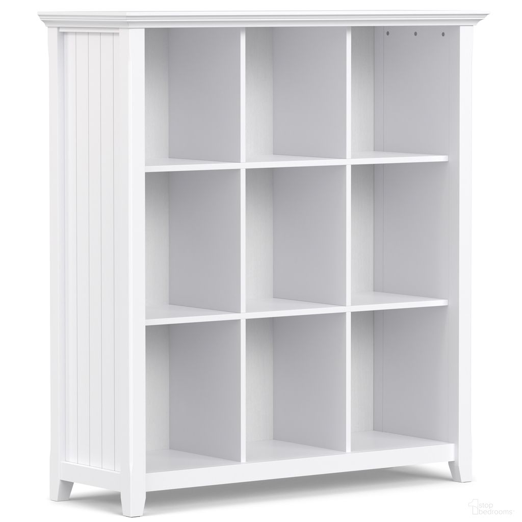 The appearance of Acadian Solid Wood 9 Cube Bookcase and Storage Unit In White designed by Simpli Home in the transitional interior design. This white piece of furniture was selected by 1StopBedrooms from Acadian Collection to add a touch of cosiness and style into your home. Sku: AXCB222-WH. Material: Pine.