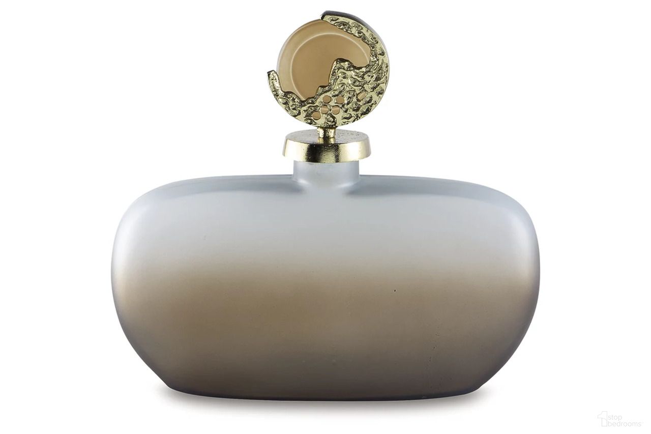 The appearance of Acario Jar In Taupe/Gold designed by Signature Design by Ashley in the traditional interior design. This taupe/gold piece of furniture  was selected by 1StopBedrooms from Acario Collection to add a touch of cosiness and style into your home. Sku: A2000781. Material: Glass.