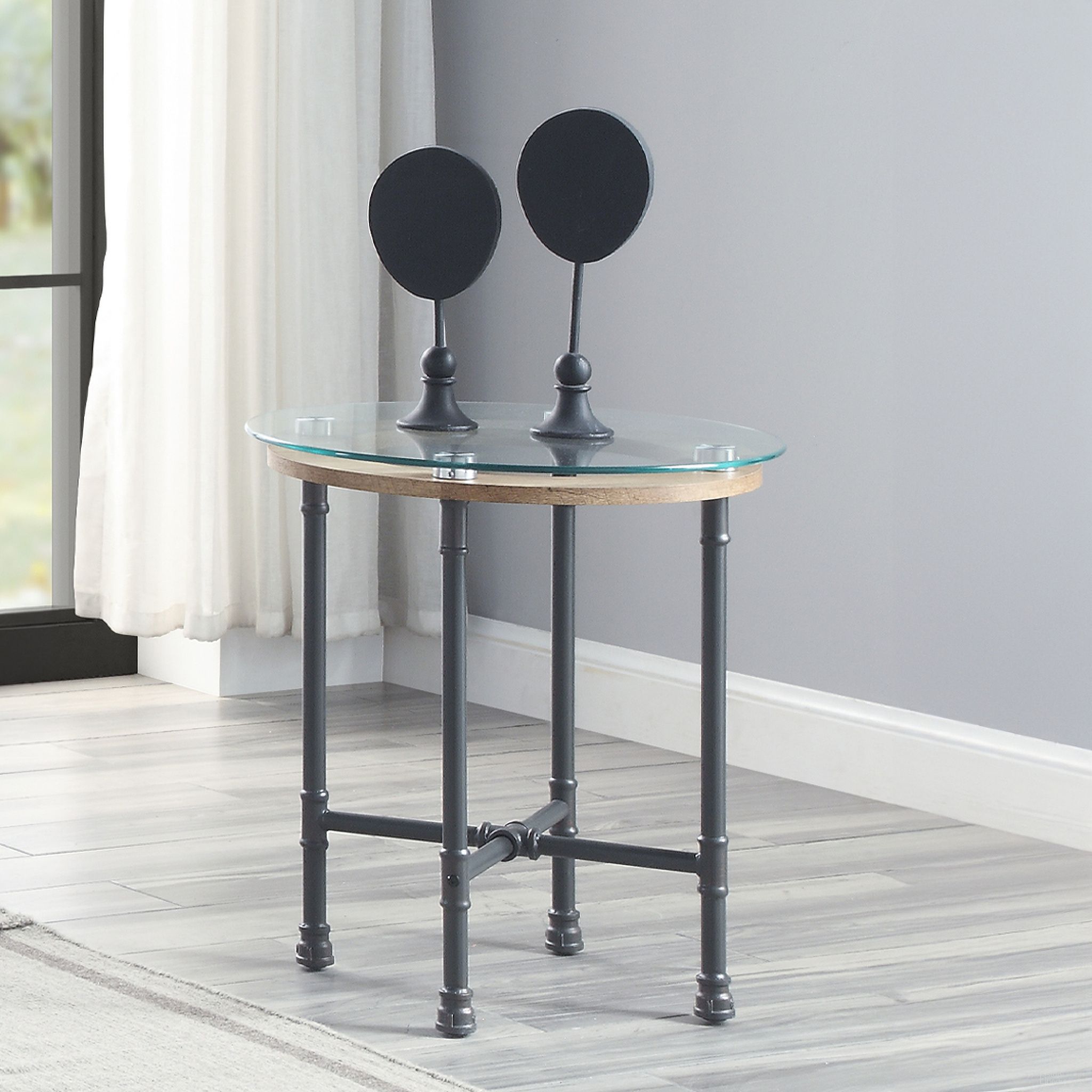 The appearance of Brantley End Table In Clear Glass designed by ACME in the industrial interior design. This clear glass piece of furniture was selected by 1StopBedrooms from Brantley Collection to add a touch of cosiness and style into your home. Sku: LV00436. Material: Metal.