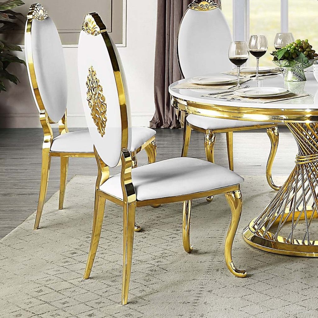 The appearance of Acme Fallon Side Chair Set of 2 In White Pu and Mirrored Gold Finish designed by ACME in the modern / contemporary interior design. This gold piece of furniture  was selected by 1StopBedrooms from Fallon Collection to add a touch of cosiness and style into your home. Sku: DN01190. Material: Stainless Steel. Chair Type: Side Chair.