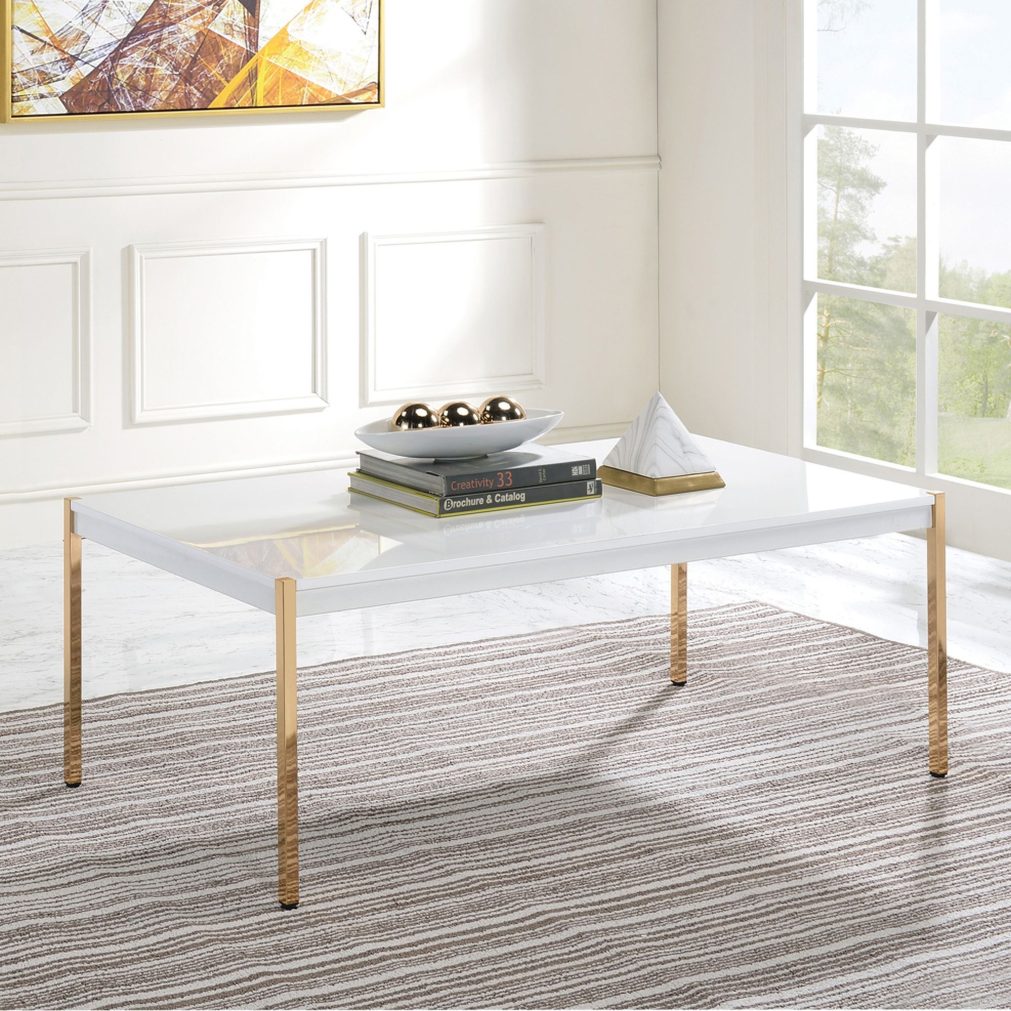 The appearance of Acme Otrac Coffee Table designed by ACME in the modern / contemporary interior design. This white and gold piece of furniture  was selected by 1StopBedrooms from Otrac Collection to add a touch of cosiness and style into your home. Sku: LV00034. Material: Wood.
