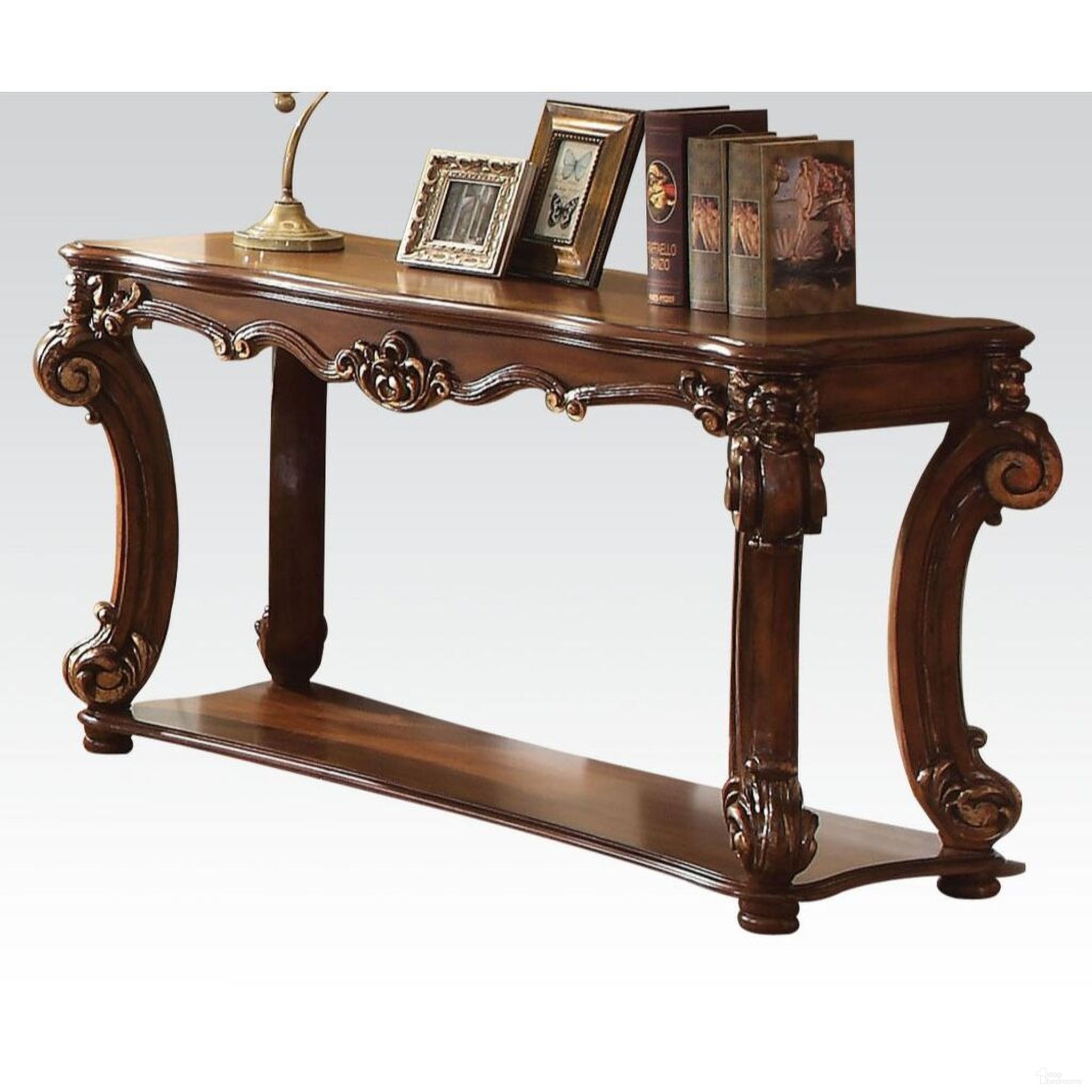 The appearance of Vendome Sofa Table In Cherry designed by ACME in the rustic / southwestern interior design. This cherry piece of furniture was selected by 1StopBedrooms from Vendome Collection to add a touch of cosiness and style into your home. Sku: 82004. Material: Wood.