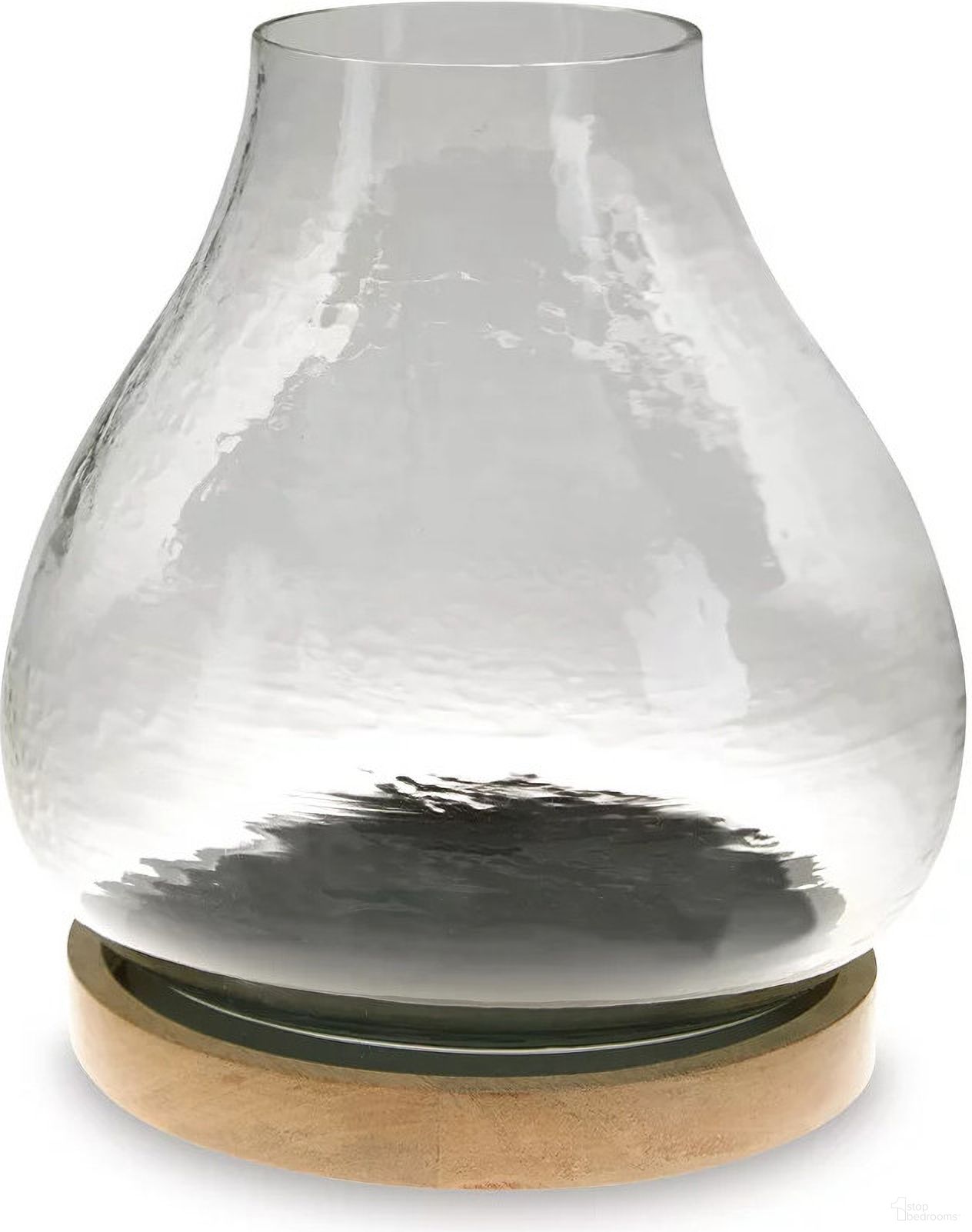 The appearance of Adalisen Candle Holder In Clear designed by Signature Design by Ashley in the transitional interior design. This clear/brown piece of furniture was selected by 1StopBedrooms from Adalisen Collection to add a touch of cosiness and style into your home. Sku: A2000679. Material: Glass.