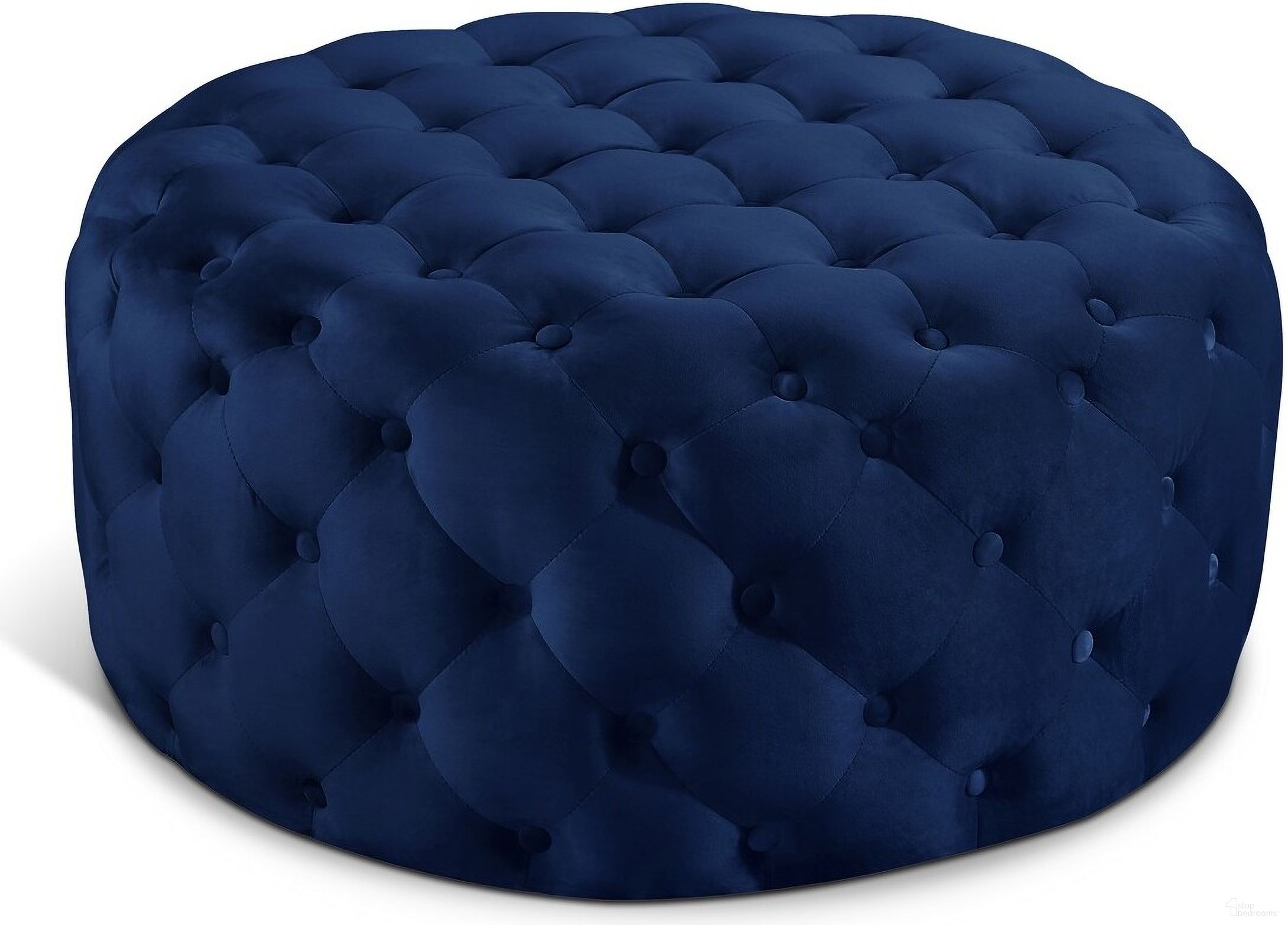 The appearance of Addison Velvet Ottoman/Bench In Navy designed by Meridian in the modern / contemporary interior design. This navy piece of furniture  was selected by 1StopBedrooms from Addison Collection to add a touch of cosiness and style into your home. Sku: 122Navy. Material: Velvet.
