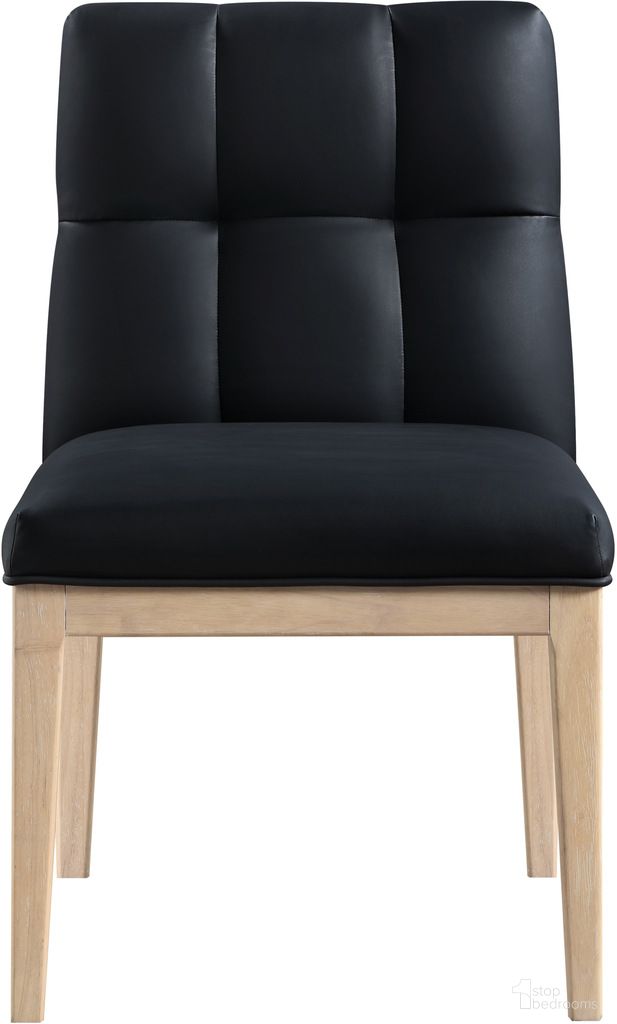 The appearance of Adrian Vegan Leather Dining Side Chair Set of 2 In Black and Natural designed by Meridian in the modern / contemporary interior design. This black and natural piece of furniture  was selected by 1StopBedrooms from Adrian Collection to add a touch of cosiness and style into your home. Sku: 971Black-SC. Material: Vegan Leather. Chair Type: Side Chair.