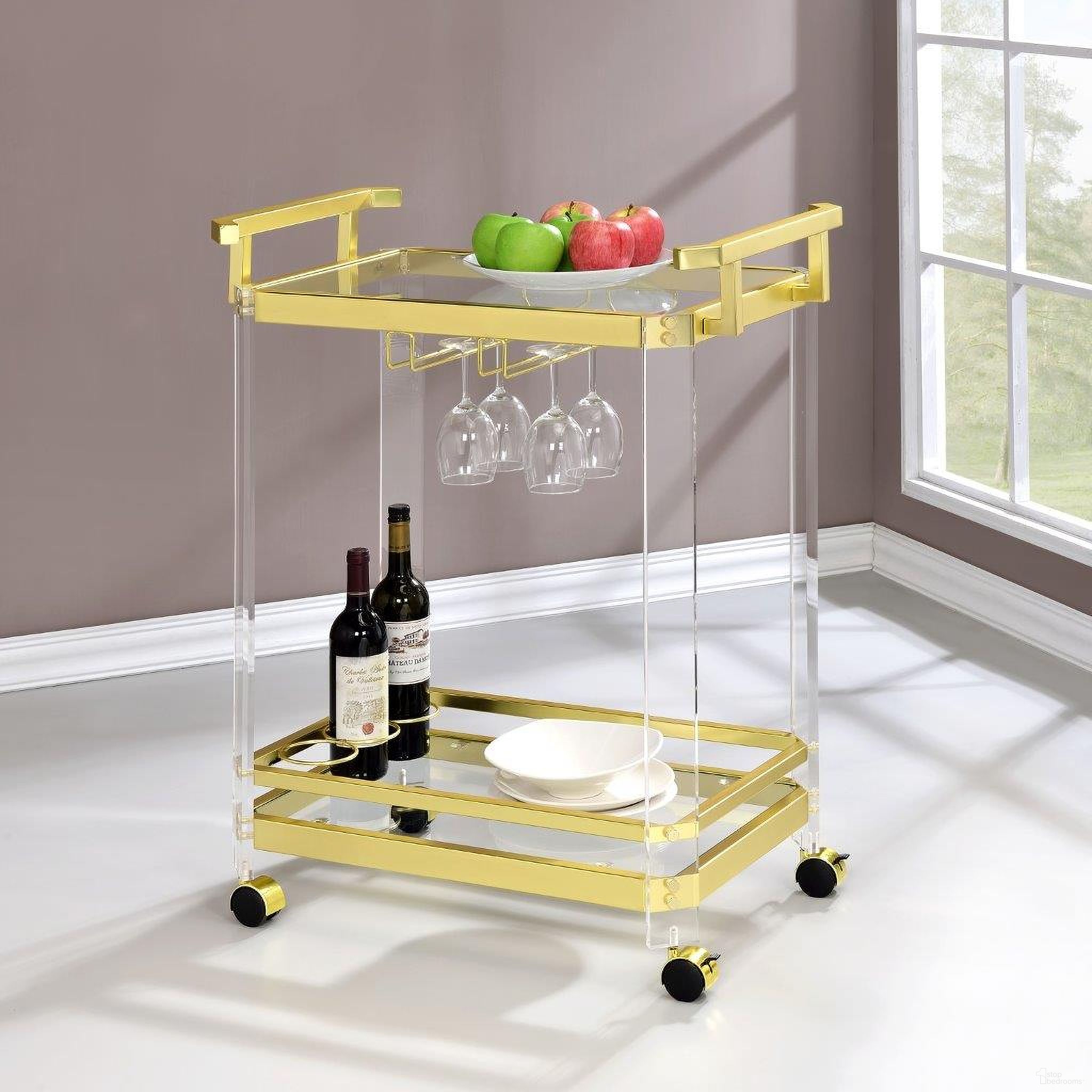 The appearance of Aerin Server Cart Gold with Acrylic designed by Steve Silver in the modern / contemporary interior design. This gold piece of furniture  was selected by 1StopBedrooms from Aerin Collection to add a touch of cosiness and style into your home. Sku: AE100CAS. Material: Acrylic.