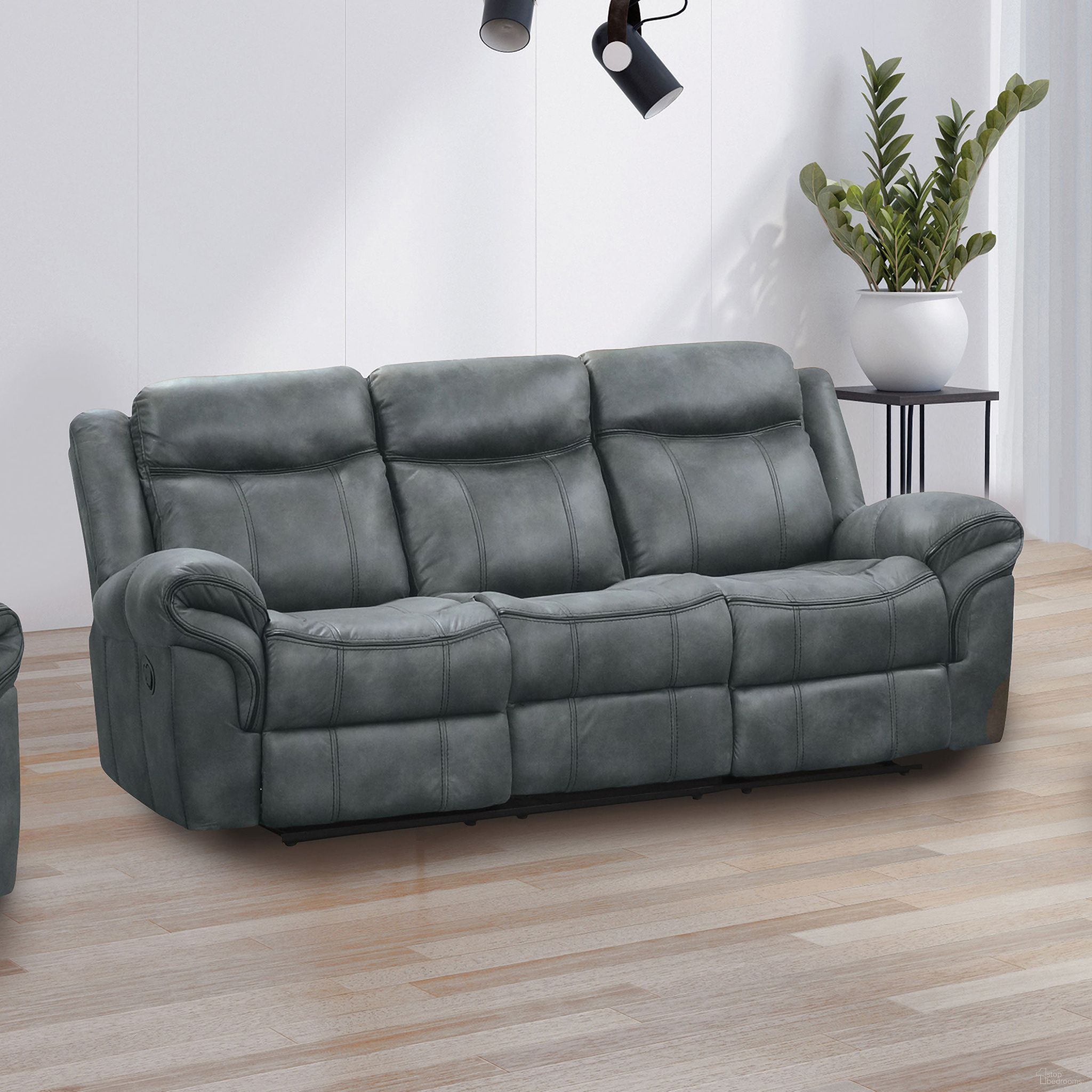 The appearance of Agata Manual Sofa In Dark Gray designed by Furniture of America in the transitional interior design. This dark gray piece of furniture was selected by 1StopBedrooms from Agata Collection to add a touch of cosiness and style into your home. Sku: NX6001DG-SF. Material: Leather.