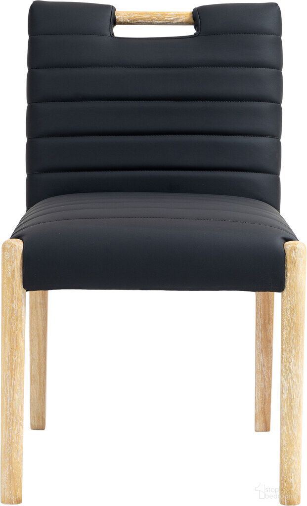The appearance of Aimee Vegan Leather Dining Side Chair Set of 2 In Black and Natural designed by Meridian in the modern / contemporary interior design. This black and natural piece of furniture was selected by 1StopBedrooms from Aimee Collection to add a touch of cosiness and style into your home. Sku: 11026Black-SC. Material: Vegan Leather. Chair Type: Side Chair.
