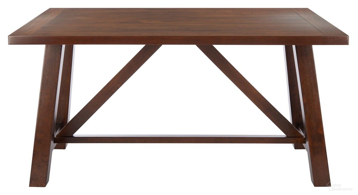 The appearance of Ainslee Rectangle Dining Table in Brown designed by Safavieh in the modern / contemporary interior design. This brown piece of furniture was selected by 1StopBedrooms from Ainslee Collection to add a touch of cosiness and style into your home. Sku: DTB9217A. Table Base Style: Trestle. Material: Wood. Table Top Shape: Rectangular. Size: 36" x 57".