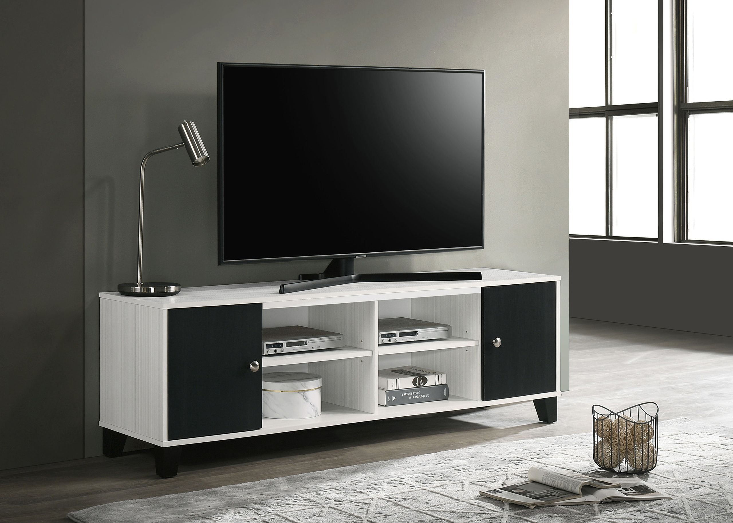 The appearance of Akerson TV Stand In White designed by Crown Mark in the modern / contemporary interior design. This white piece of furniture  was selected by 1StopBedrooms from Akerson Collection to add a touch of cosiness and style into your home. Sku: B4610-9. Material: MDF.