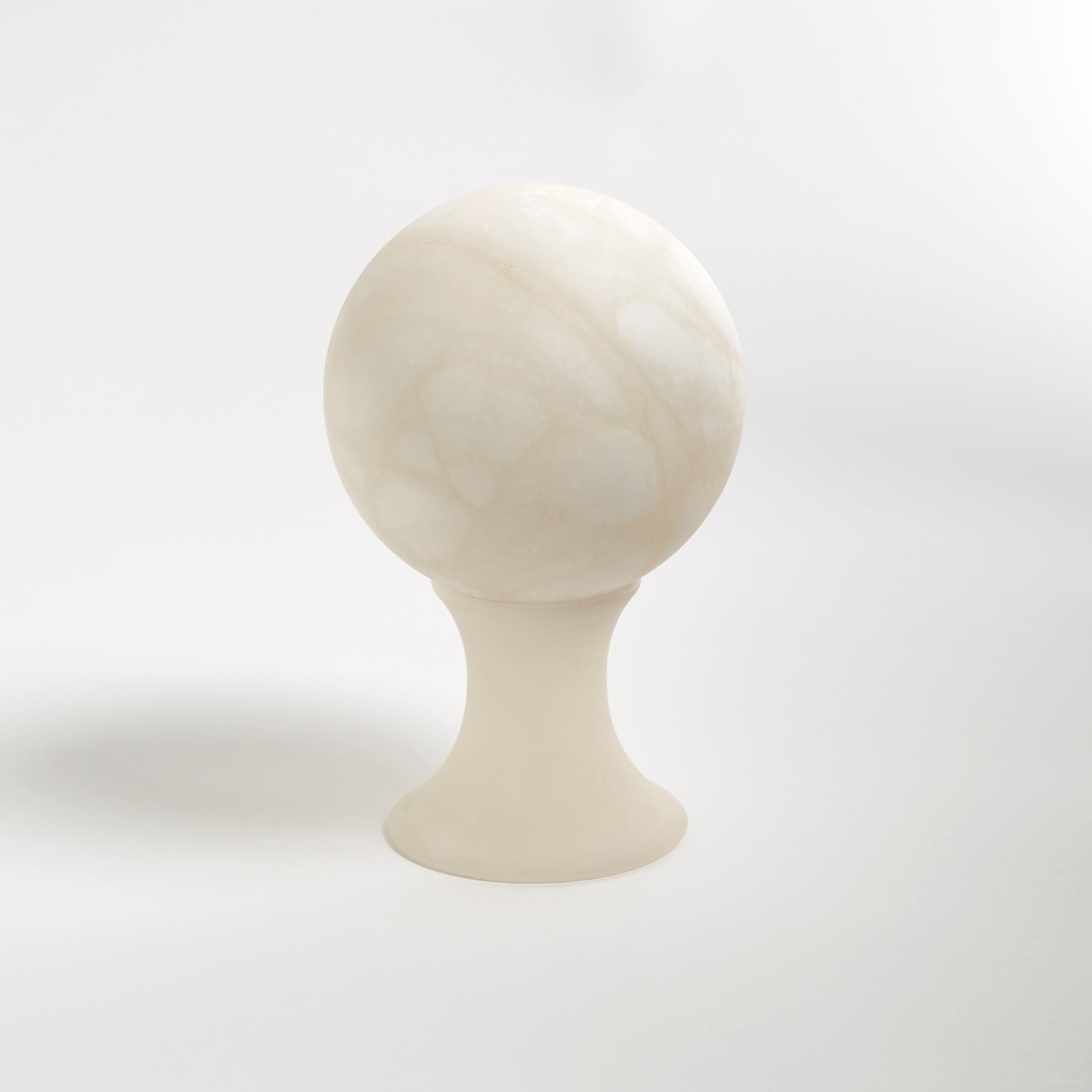 The appearance of Alabaster Large Sphere Stand In White designed by Global Views in the modern / contemporary interior design. This white piece of furniture was selected by 1StopBedrooms from Alabaster Collection to add a touch of cosiness and style into your home. Sku: 331551. Material: Alabaster.