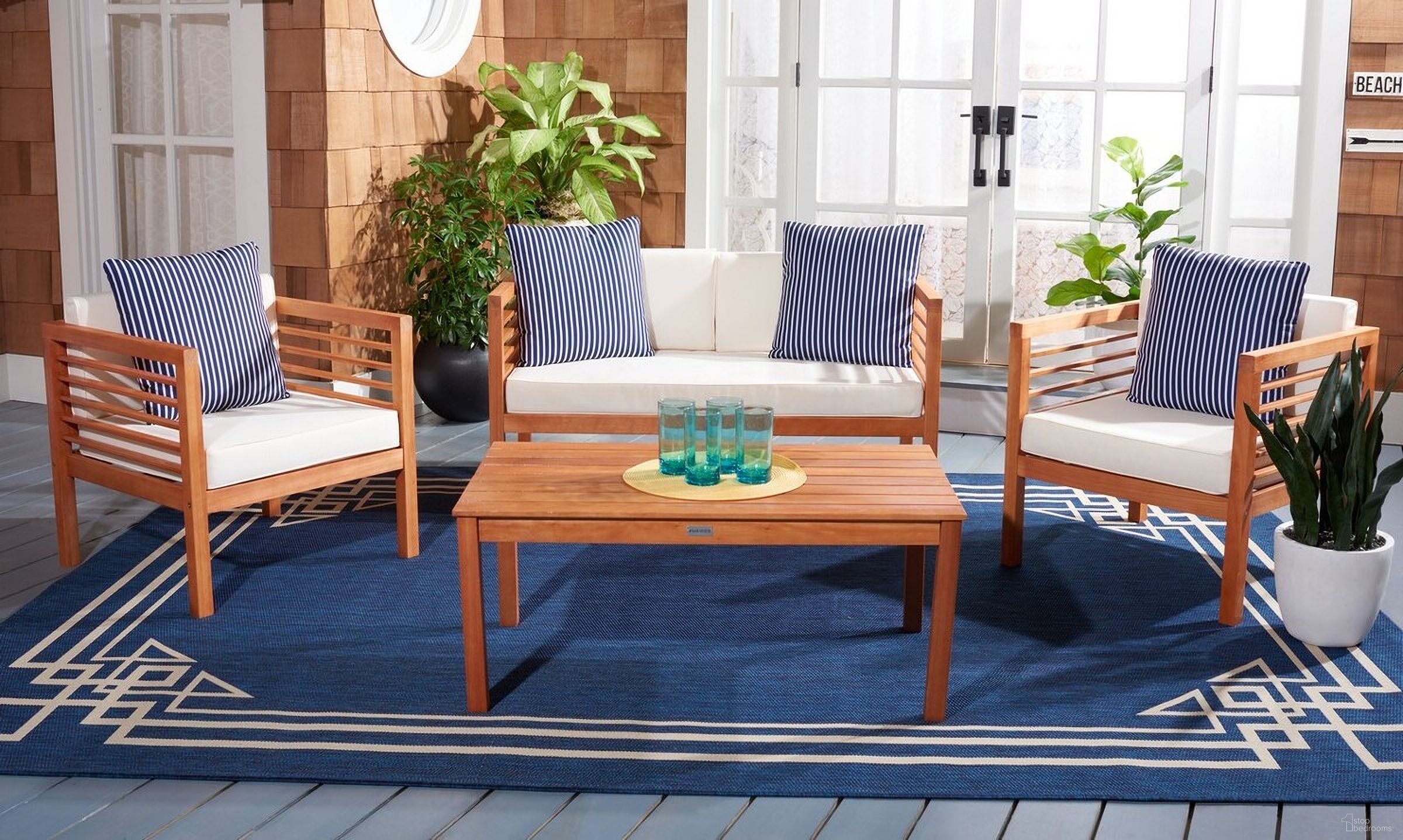 The appearance of Alda 4 Piece Outdoor Set with Accent Pillows In Natural and Beige designed by Safavieh in the modern / contemporary interior design. This natural and beige piece of furniture  was selected by 1StopBedrooms from Alda Collection to add a touch of cosiness and style into your home. Sku: PAT7033F. Material: Wood.