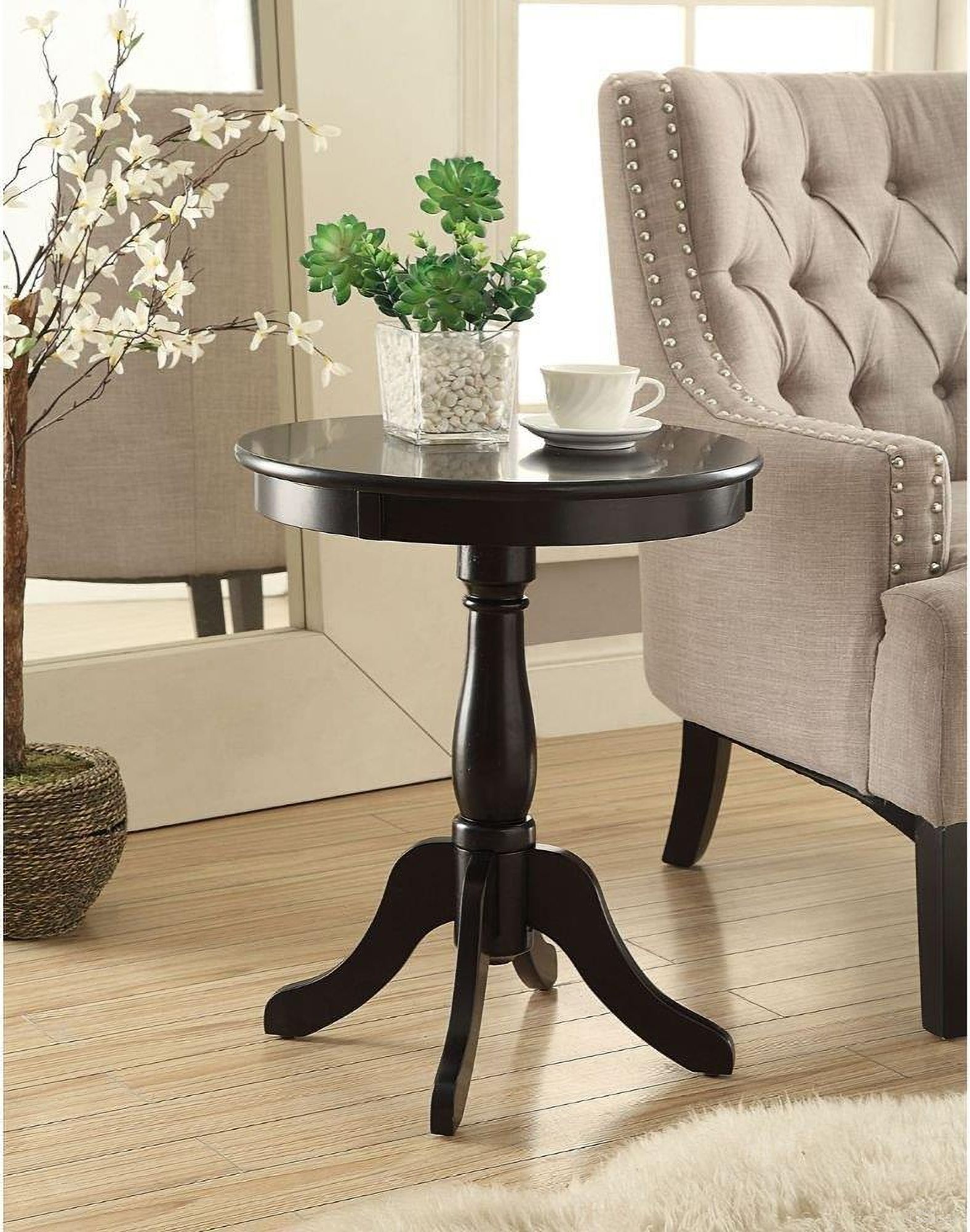 The appearance of Alger Accent Table In Black designed by ACME in the traditional interior design. This black piece of furniture  was selected by 1StopBedrooms from Alger Collection to add a touch of cosiness and style into your home. Sku: 82808A. Material: Wood.