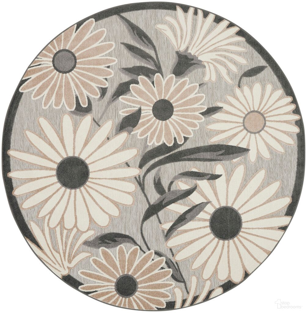 The appearance of Aloha 5'3" x 5'3" Round Rug In Beige designed by Nourison in the modern / contemporary interior design. This beige piece of furniture was selected by 1StopBedrooms from Aloha Collection to add a touch of cosiness and style into your home. Sku: 99446933560. Material: Polypropylene.