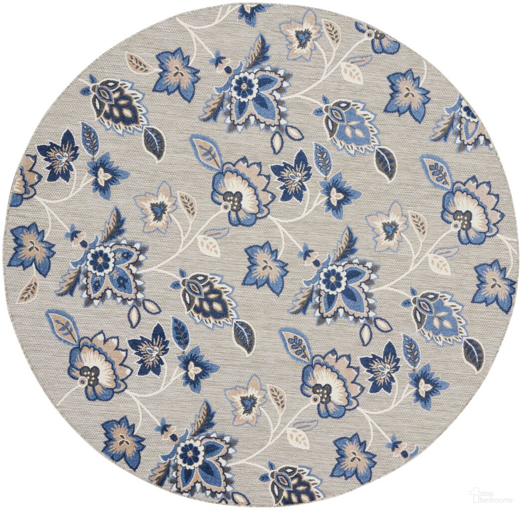 The appearance of Aloha 7'10" x 7'10" Round Contemporary Rug In Blue Grey designed by Nourison in the modern / contemporary interior design. This blue grey piece of furniture was selected by 1StopBedrooms from Aloha Collection to add a touch of cosiness and style into your home. Sku: 99446169167. Material: Polypropylene.