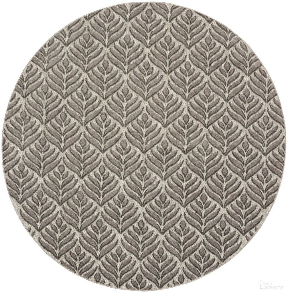 The appearance of Aloha 7'10" x 7'10" Round Rug In Charcoal designed by Nourison in the nautical & coastal interior design. This charcoal piece of furniture was selected by 1StopBedrooms from Aloha Collection to add a touch of cosiness and style into your home. Sku: 99446174734. Material: Polypropylene.