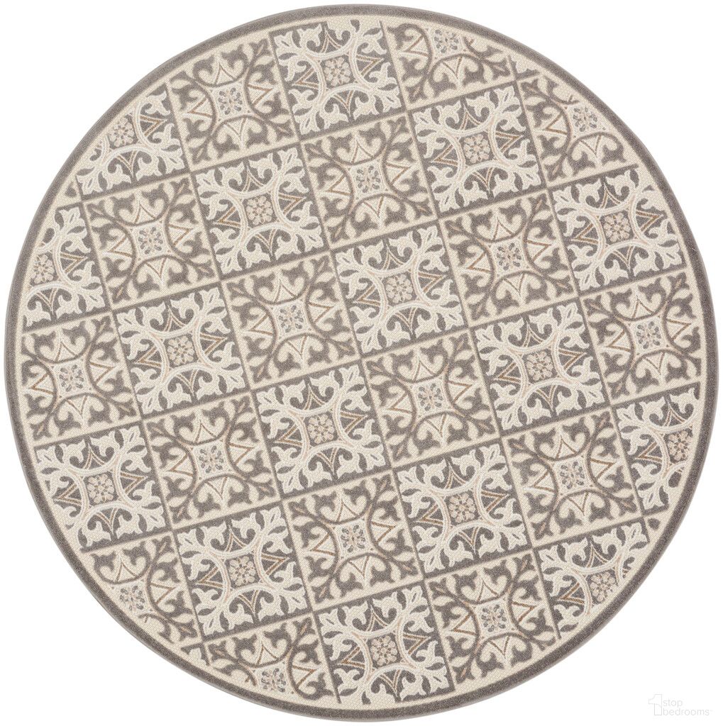 The appearance of Aloha 7'10" x 7'10" Round Contemporary Rug In Ivory Grey designed by Nourison in the modern / contemporary interior design. This ivory grey piece of furniture  was selected by 1StopBedrooms from Aloha Collection to add a touch of cosiness and style into your home. Sku: 99446173904. Material: Polypropylene.