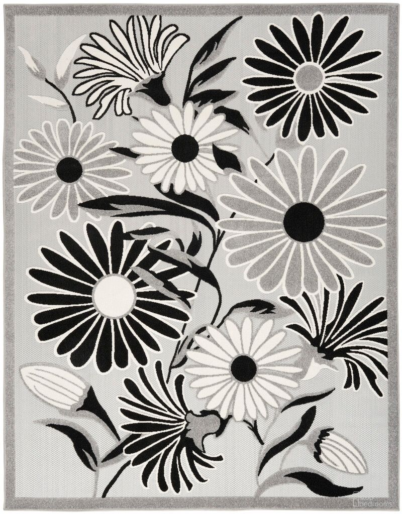The appearance of Aloha 9' x 12' Contemporary Rug In Black White designed by Nourison in the modern / contemporary interior design. This black white piece of furniture  was selected by 1StopBedrooms from Aloha Collection to add a touch of cosiness and style into your home. Sku: 99446171665. Material: Polypropylene.