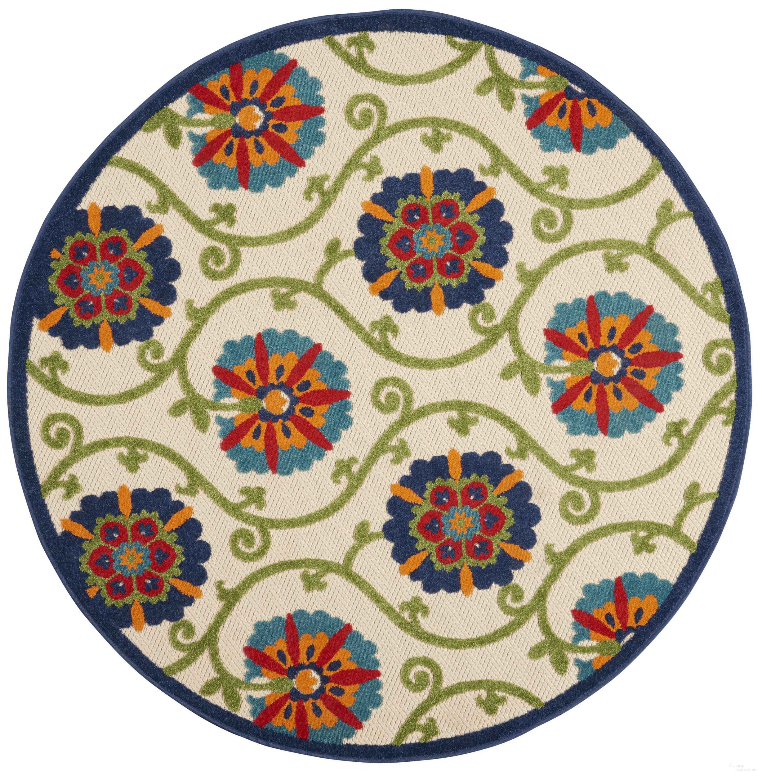 The appearance of Aloha Blue and Multicolor 4' x 4' Round Contemporary Area Rug designed by Nourison in the modern / contemporary interior design. This blue and multicolor piece of furniture  was selected by 1StopBedrooms from Aloha Collection to add a touch of cosiness and style into your home. Sku: 99446498717. Material: Polypropylene.