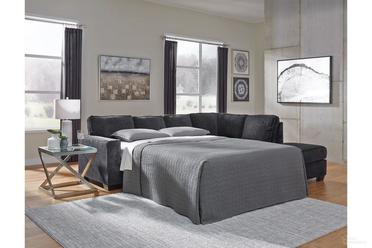 The appearance of Altari 2-Piece Sleeper Sectional and Ottoman In Slate designed by Signature Design by Ashley in the transitional interior design. This slate piece of furniture  was selected by 1StopBedrooms from Altari Collection to add a touch of cosiness and style into your home. Sku: 8721310;8721314;8721317. Material: Chenille. Layout: Sofa & Chaise.