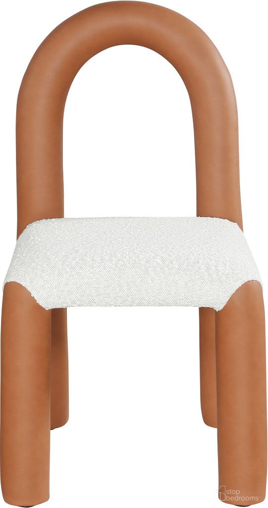 The appearance of Amari Vegan Leather and Boucle Fabric Dining Chair Set of 2 In Cognac designed by Meridian in the modern / contemporary interior design. This cognac piece of furniture  was selected by 1StopBedrooms from Amari Collection to add a touch of cosiness and style into your home. Sku: 11065Cognac-C. Material: Vegan Leather. Chair Type: Side Chair.