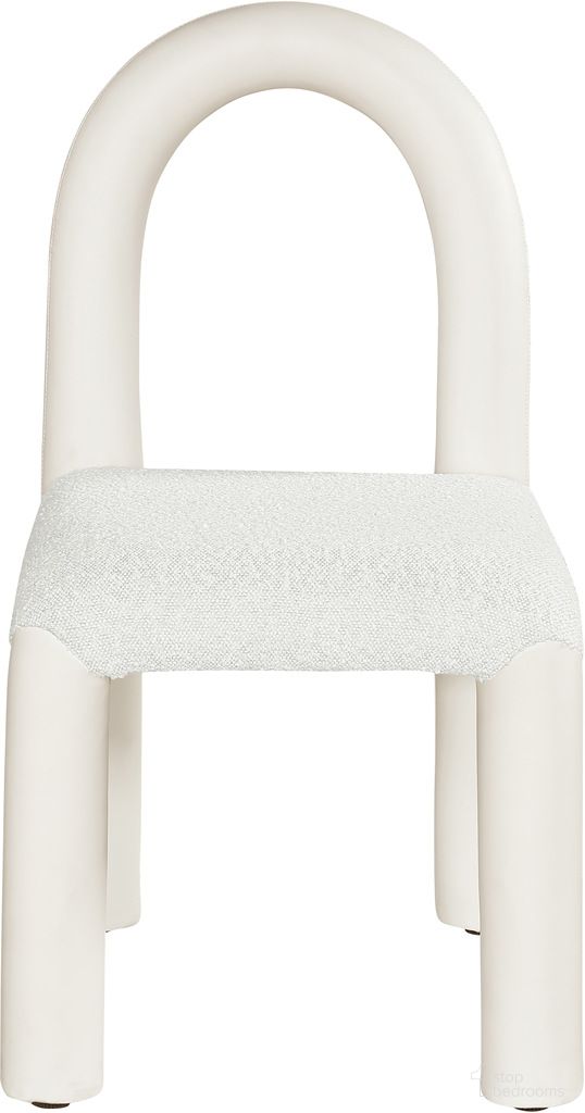 The appearance of Amari Vegan Leather and Boucle Fabric Dining Chair Set of 2 In Cream designed by Meridian in the modern / contemporary interior design. This cream piece of furniture was selected by 1StopBedrooms from Amari Collection to add a touch of cosiness and style into your home. Sku: 11065Cream-C. Material: Vegan Leather. Chair Type: Side Chair.
