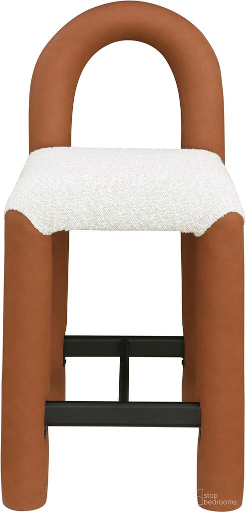 The appearance of Amari Vegan Leather and Boucle Fabric Stool In Cognac designed by Meridian in the modern / contemporary interior design. This cognac piece of furniture was selected by 1StopBedrooms from Amari Collection to add a touch of cosiness and style into your home. Sku: 11066Cognac-C. Material: Vegan Leather.