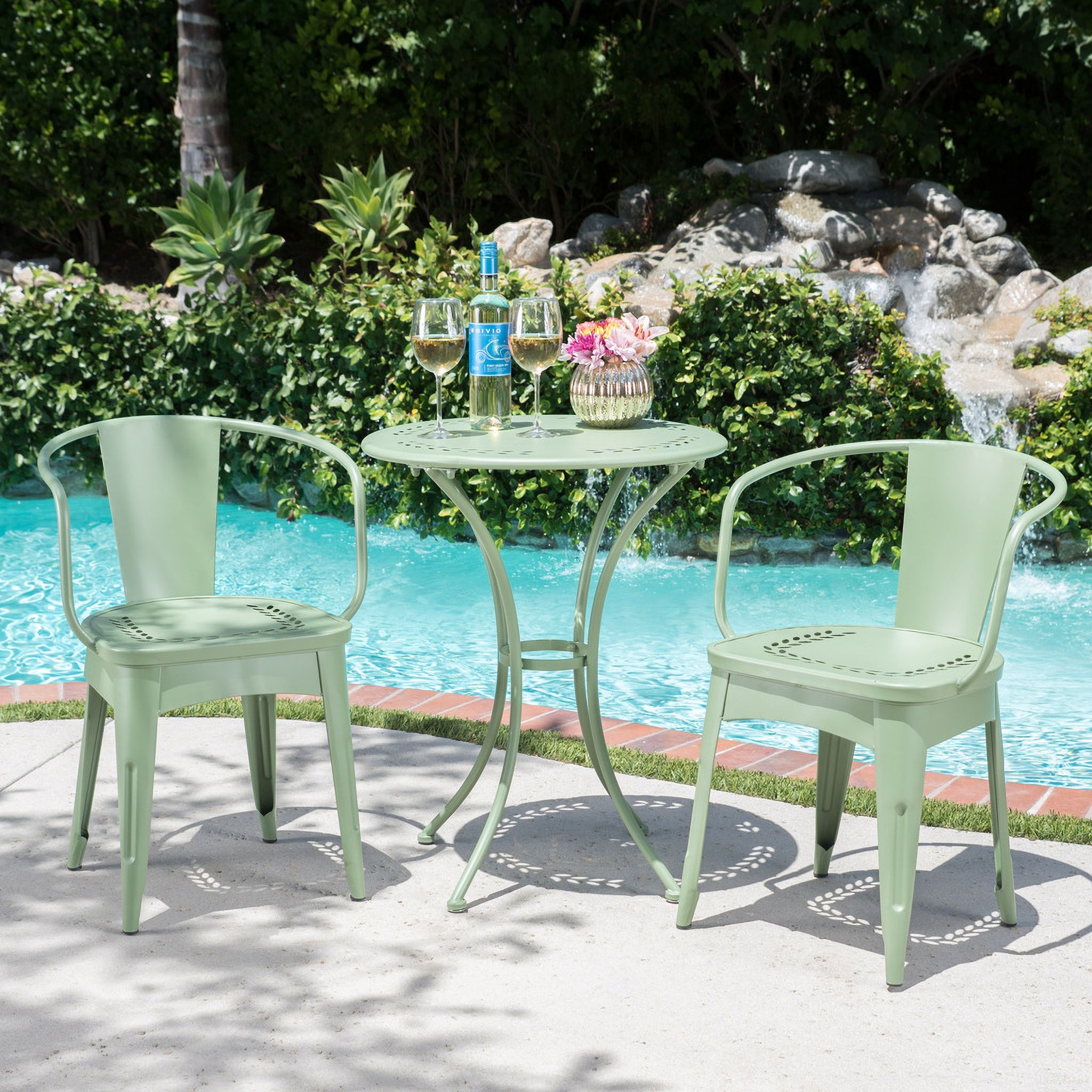 The appearance of Ambrosia 3-Piece Bistro Set with Leaf Motifs Top and Seat In Green designed by Noble House in the modern / contemporary interior design. This green piece of furniture was selected by 1StopBedrooms from Ambrosia Collection to add a touch of cosiness and style into your home. Sku: 56559.00MCG. Material: Iron.