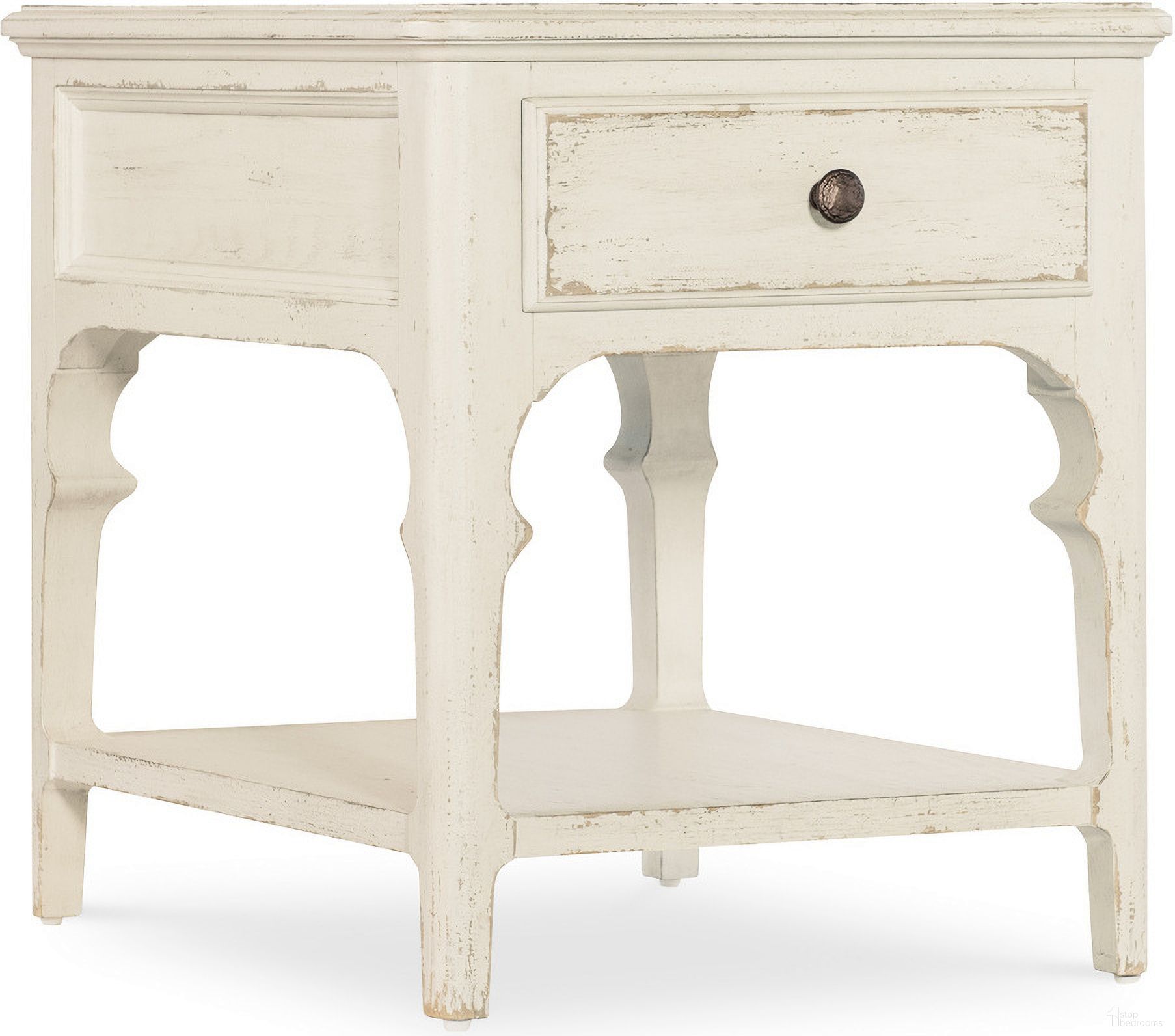 The appearance of Americana End Table In White designed by Hooker in the transitional interior design. This white piece of furniture was selected by 1StopBedrooms from Americana Collection to add a touch of cosiness and style into your home. Sku: 7050-80214-02. Material: Oak Veneer.