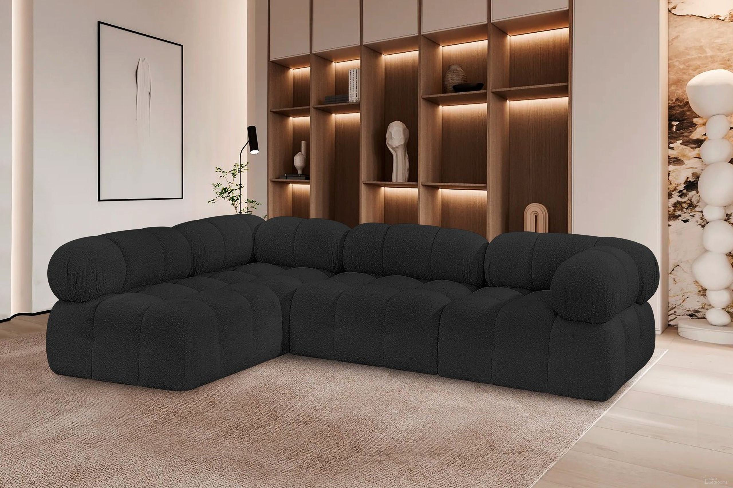 The appearance of Ames Boucle Fabric 4 Piece Modular Sectional In Black designed by Meridian in the modern / contemporary interior design. This black piece of furniture  was selected by 1StopBedrooms from Ames Collection to add a touch of cosiness and style into your home. Sku: 611Black-Armless;611Black-Armless;611Black-Corner;611Black-Corner. Layout: Modular. Material: Boucle.