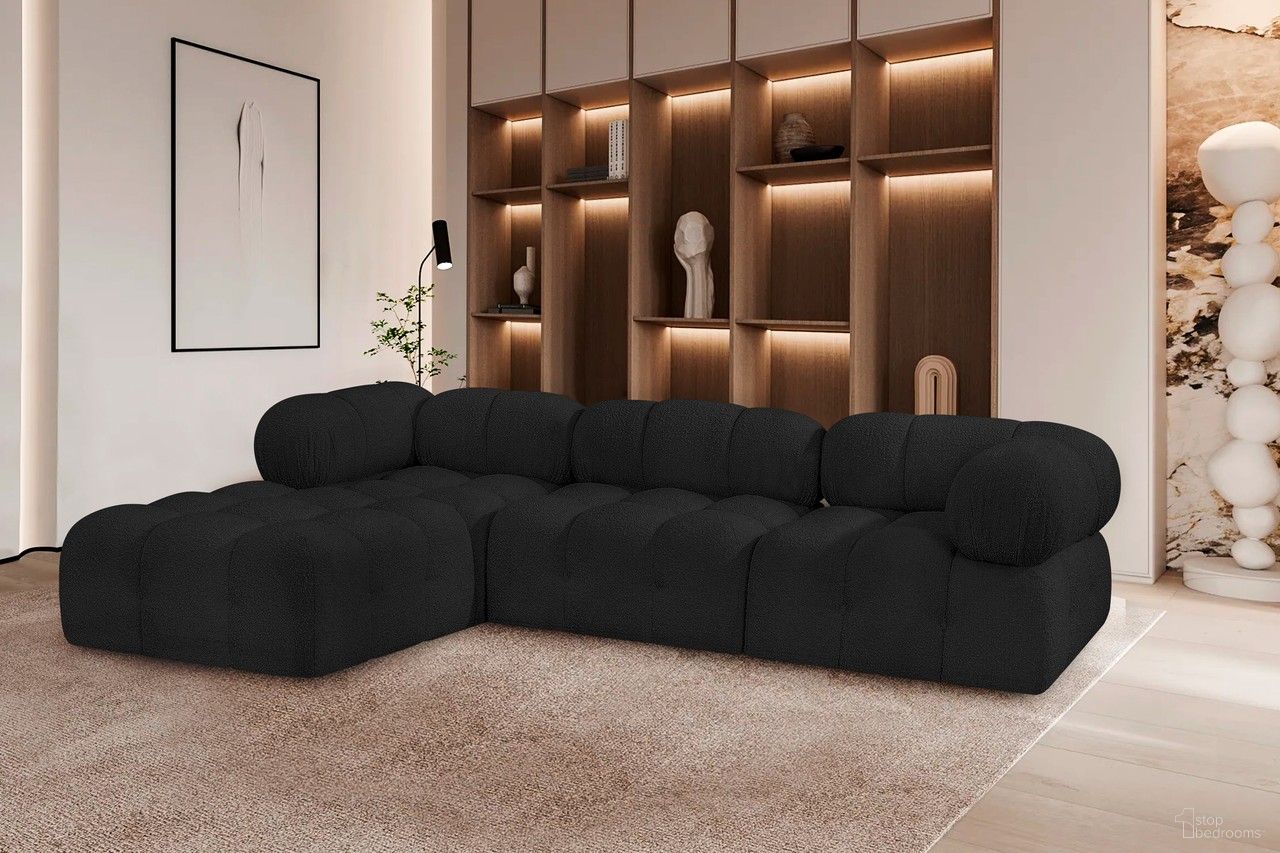 The appearance of Ames Boucle Fabric 4 Piece Modular Sectional In Black designed by Meridian in the modern / contemporary interior design. This black piece of furniture  was selected by 1StopBedrooms from Ames Collection to add a touch of cosiness and style into your home. Sku: 611Black-Armless;611Black-Corner;611Black-Corner;611Black-Ott. Layout: Modular. Material: Boucle.