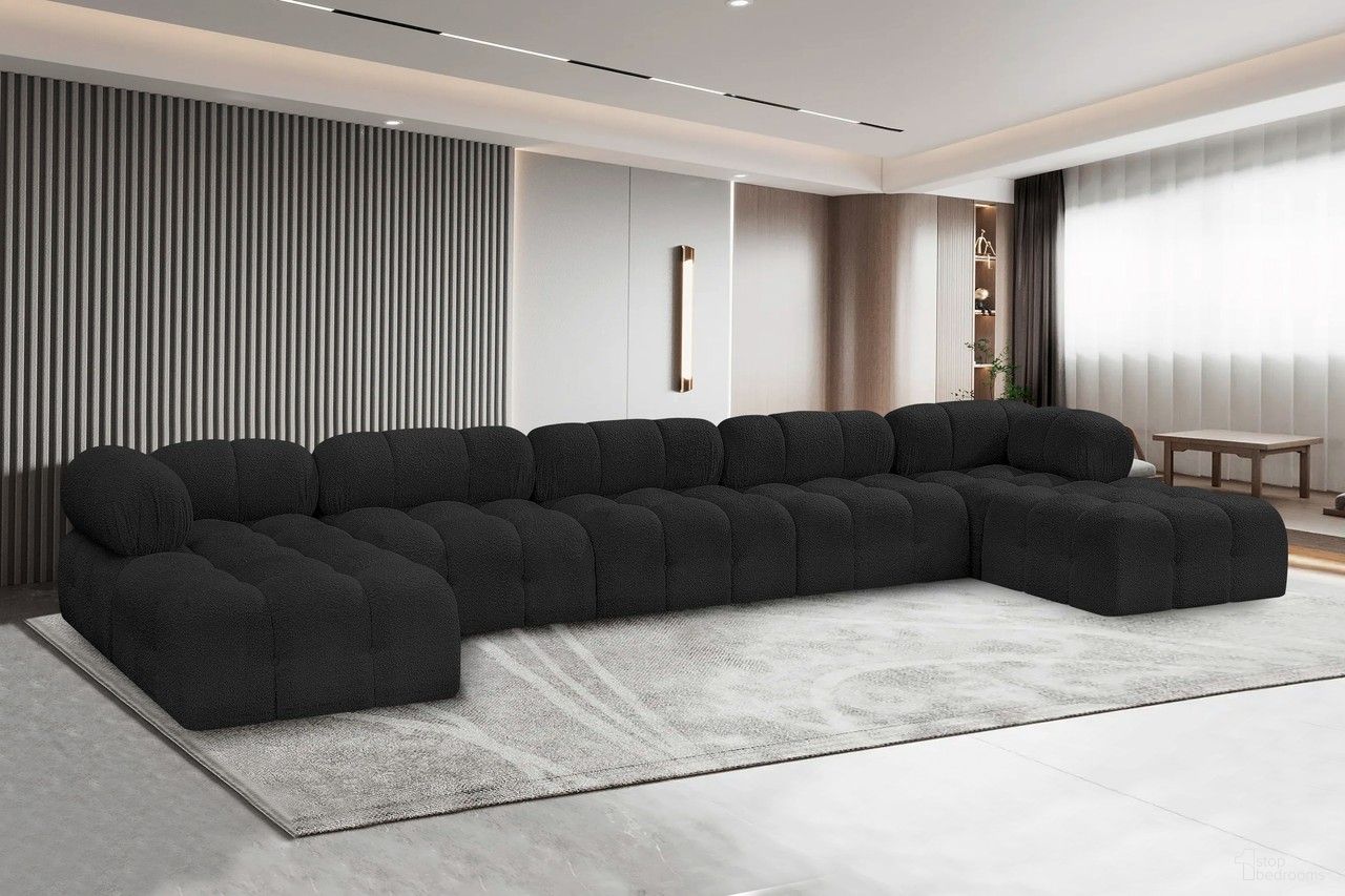 The appearance of Ames Boucle Fabric 7 Piece Modular Sectional In Black designed by Meridian in the modern / contemporary interior design. This black piece of furniture  was selected by 1StopBedrooms from Ames Collection to add a touch of cosiness and style into your home. Sku: 611Black-Armless;611Black-Armless;611Black-Armless;611Black-Corner;611Black-Corner;611Black-Ott;611Black-Ott. Layout: Modular. Material: Boucle.