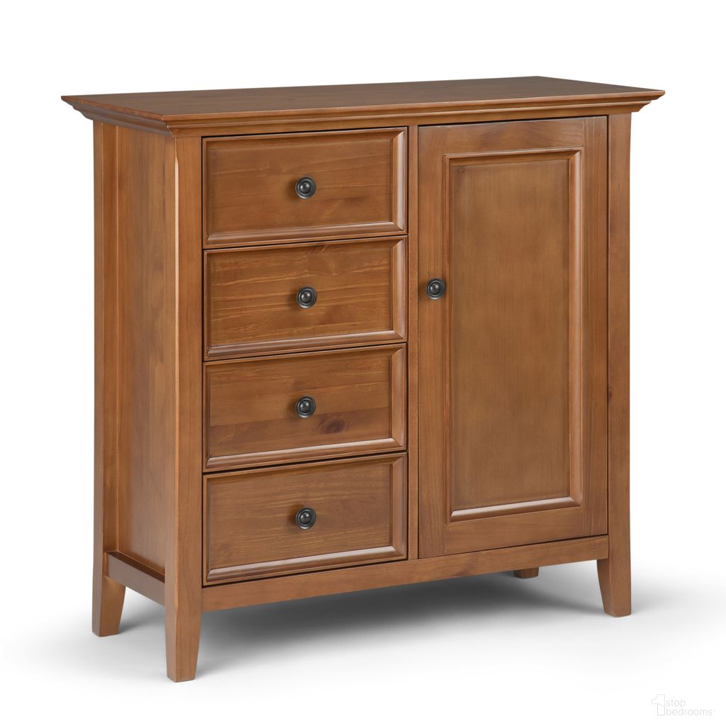 The appearance of Amherst Solid Wood Medium Storage Cabinet In Light Golden Brown designed by Simpli Home in the transitional interior design. This light golden brown piece of furniture  was selected by 1StopBedrooms from Amherst Collection to add a touch of cosiness and style into your home. Sku: AXCRAMH15-LGB. Material: Pine.