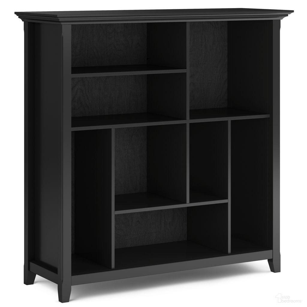 The appearance of Amherst Solid Wood Multi Cube Bookcase and Storage Unit In Black designed by Simpli Home in the transitional interior design. This black piece of furniture was selected by 1StopBedrooms from Amherst Collection to add a touch of cosiness and style into your home. Sku: AXCAMH19-BL. Material: Pine.