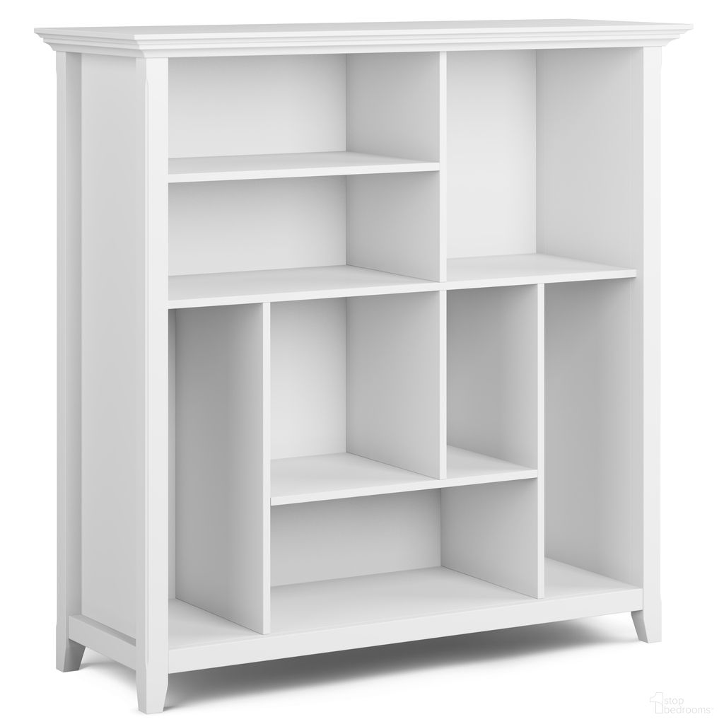 The appearance of Amherst Solid Wood Multi Cube Bookcase and Storage Unit In White designed by Simpli Home in the transitional interior design. This white piece of furniture was selected by 1StopBedrooms from Amherst Collection to add a touch of cosiness and style into your home. Sku: AXCAMH19-WH. Material: Pine.