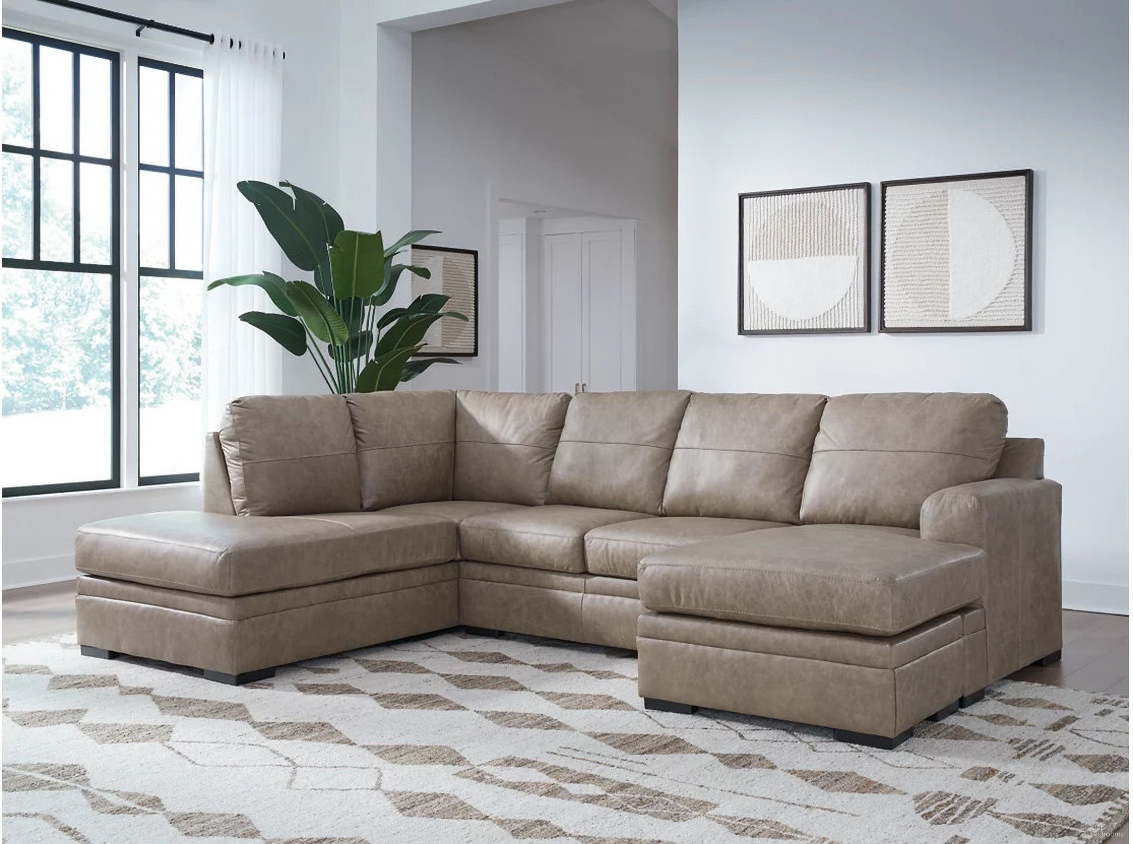 The appearance of Amuleto 2 Piece Sectional with Chaise In Desert designed by Signature Design by Ashley in the modern / contemporary interior design. This desert piece of furniture  was selected by 1StopBedrooms from Amuleto Collection to add a touch of cosiness and style into your home. Sku: 2240516;2240503. Material: Leather.
