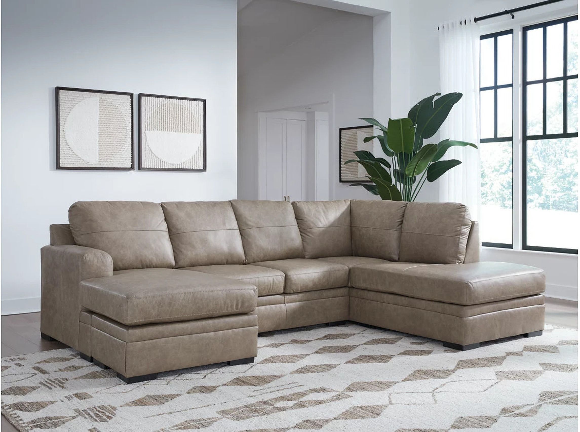 The appearance of Amuleto 2-Piece Sectional with Chaise In Desert designed by Signature Design by Ashley in the modern / contemporary interior design. This desert piece of furniture  was selected by 1StopBedrooms from Amuleto Collection to add a touch of cosiness and style into your home. Sku: 2240502;2240517. Layout: U-Shape. Material: Genuine Leather.