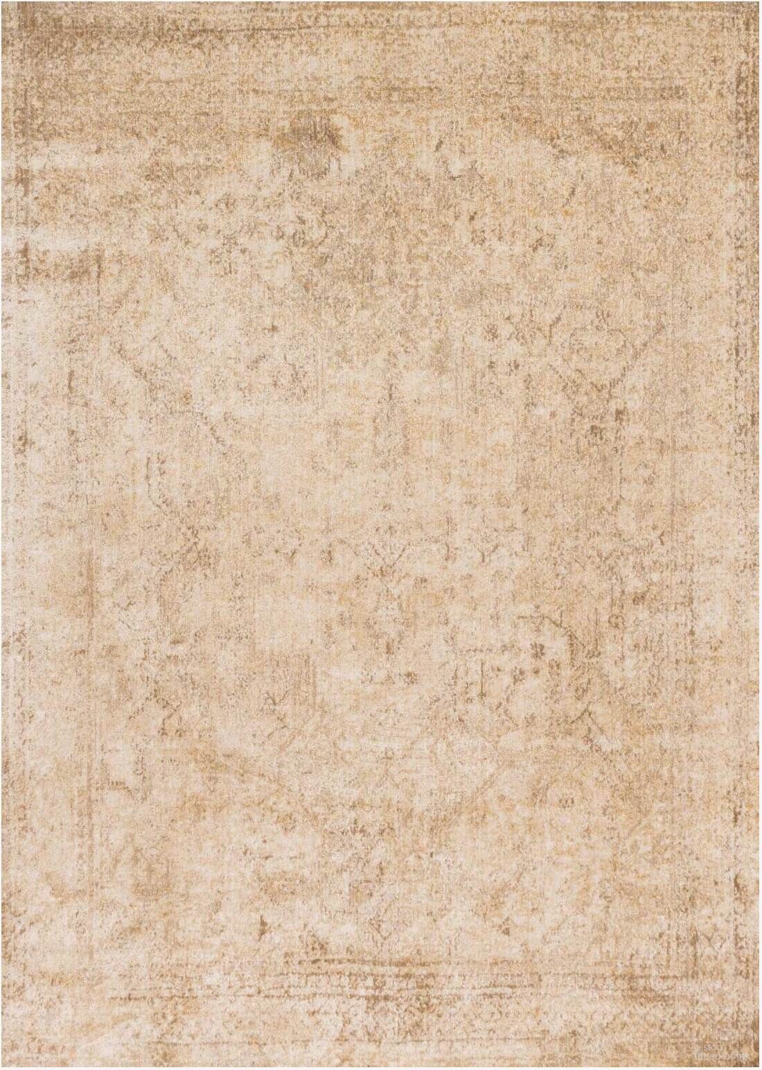 The appearance of Anastasia Ivory/Lt. Gold 2'7" x 4' Rug designed by Loloi Rugs in the transitional interior design. This ivory and light gold piece of furniture was selected by 1StopBedrooms from Anastasia Collection to add a touch of cosiness and style into your home. Sku: ANASAF-15IVLD2740. Material: Polypropylene.