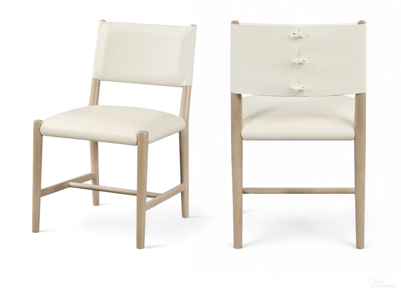 The appearance of Andie Vegan Leather Upholstered Dining Chair Set of 2 In Cream and Stained Natural designed by Meridian in the modern / contemporary interior design. This cream/stained natural piece of furniture was selected by 1StopBedrooms from Andie Collection to add a touch of cosiness and style into your home. Sku: 88074Cream-C. Material: Vegan Leather. Chair Type: Side Chair.