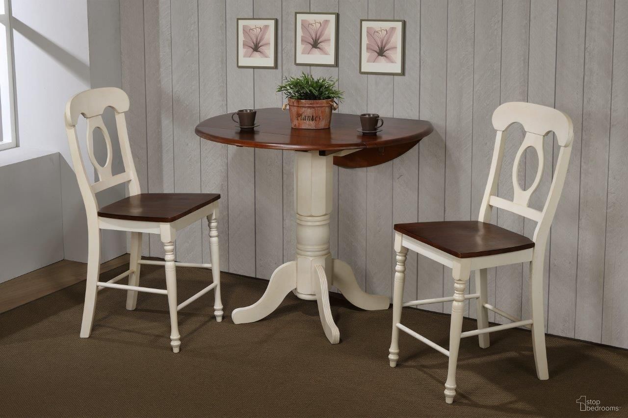 The appearance of Andrews Napoleon Stools 3 Piece 42 Inch Round Drop Leaf Pub Table Set designed by Sunset Trading in the traditional interior design. This antique white and chestnut piece of furniture was selected by 1StopBedrooms from Andrews Collection to add a touch of cosiness and style into your home. Sku: DLU-TPD-4242-CT-T;DLU-TPD-4242-AW-CB;DLU-ADW-B50-AW-RTA. Material: Wood.