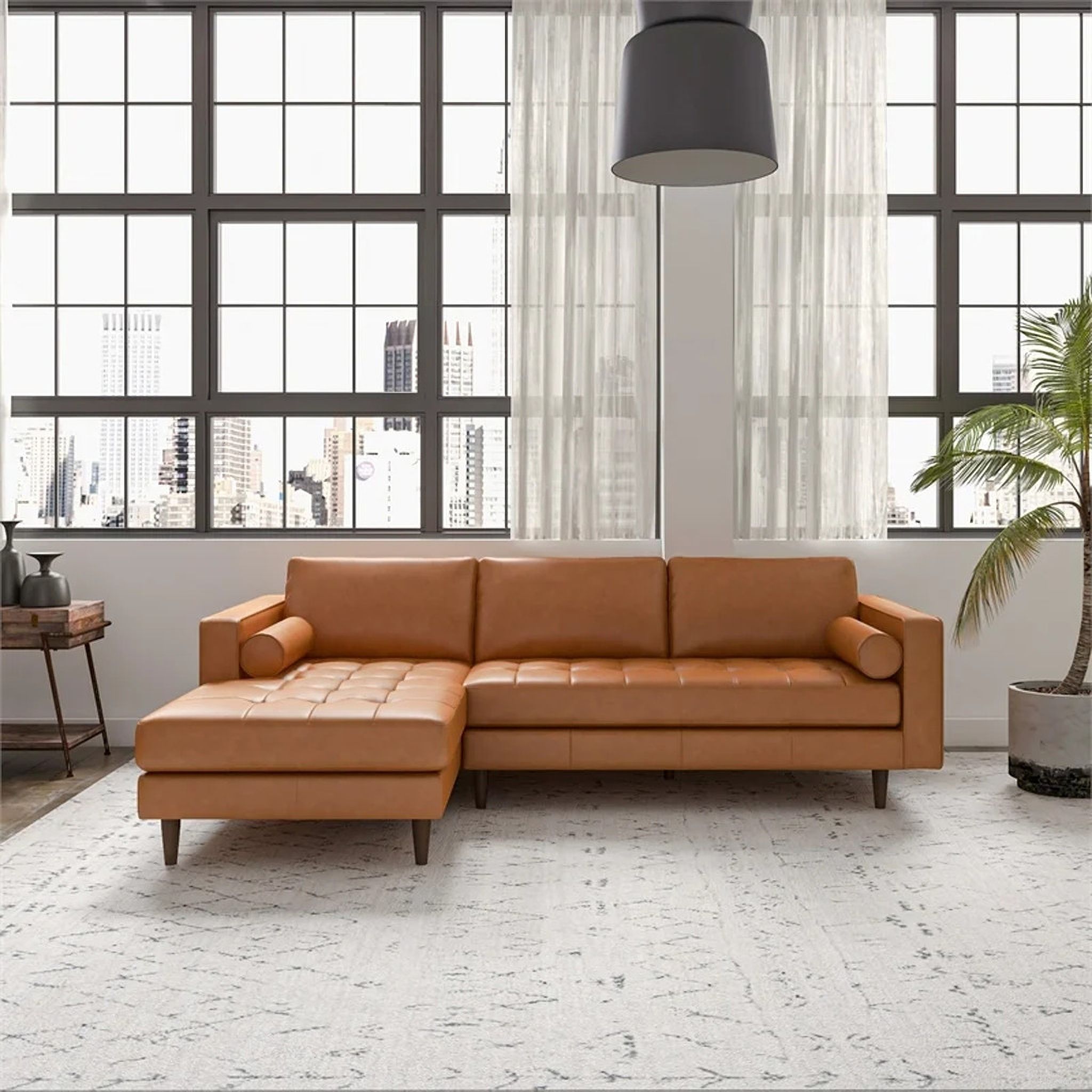 The appearance of Anthony Leather L Shape Left Facing Corner Sectional Sofa In Tan designed by Ashcroft Furniture in the transitional interior design. This tan piece of furniture  was selected by 1StopBedrooms from Anthony Collection to add a touch of cosiness and style into your home. Sku: SEC00400601. Material: Leather. Orientation: LAF.