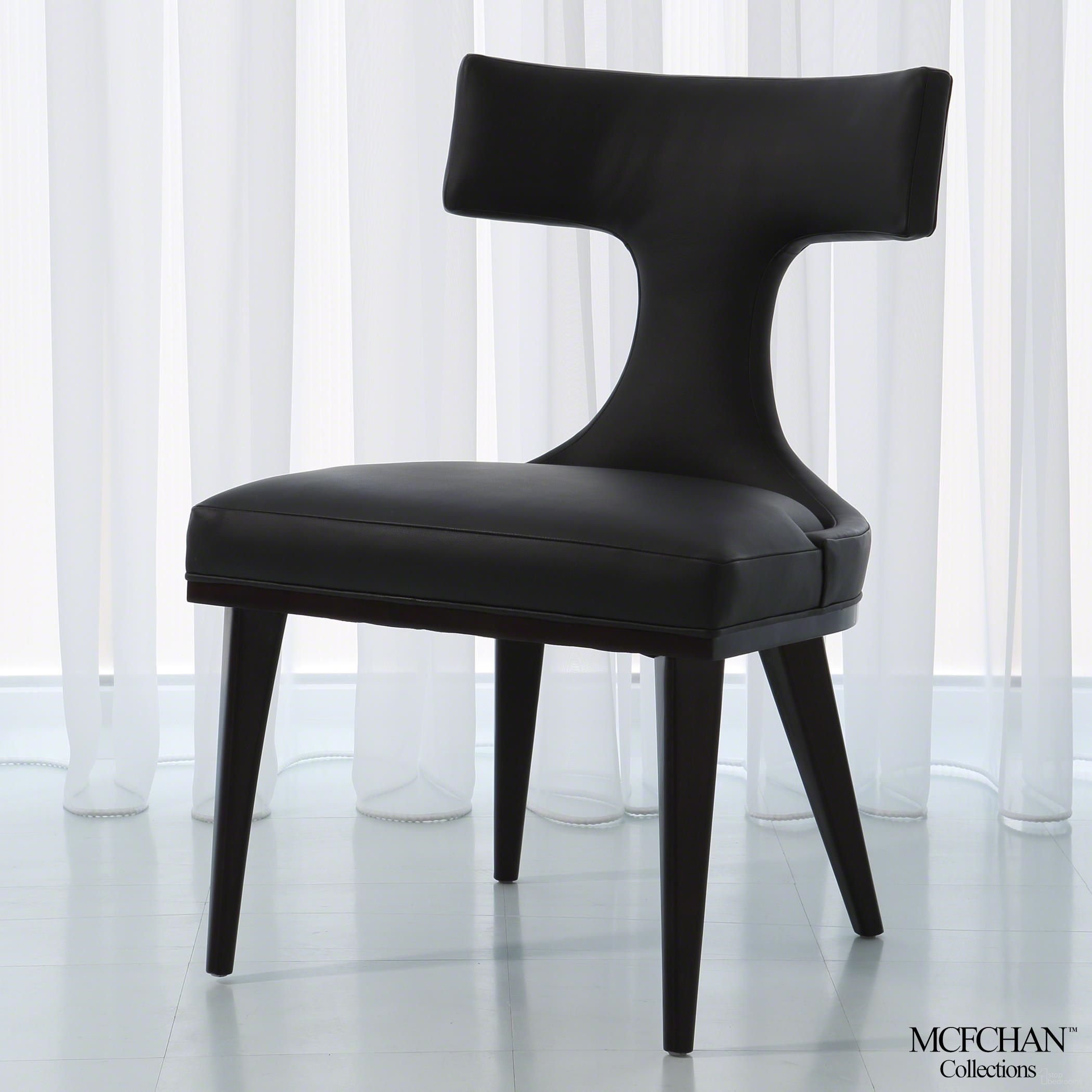 The appearance of Anvil Back Dining Chair In Black Leather designed by Global Views in the modern / contemporary interior design. This black piece of furniture was selected by 1StopBedrooms from Anvil Collection to add a touch of cosiness and style into your home. Sku: MC-2510. Material: Wood. Chair Type: Side Chair.